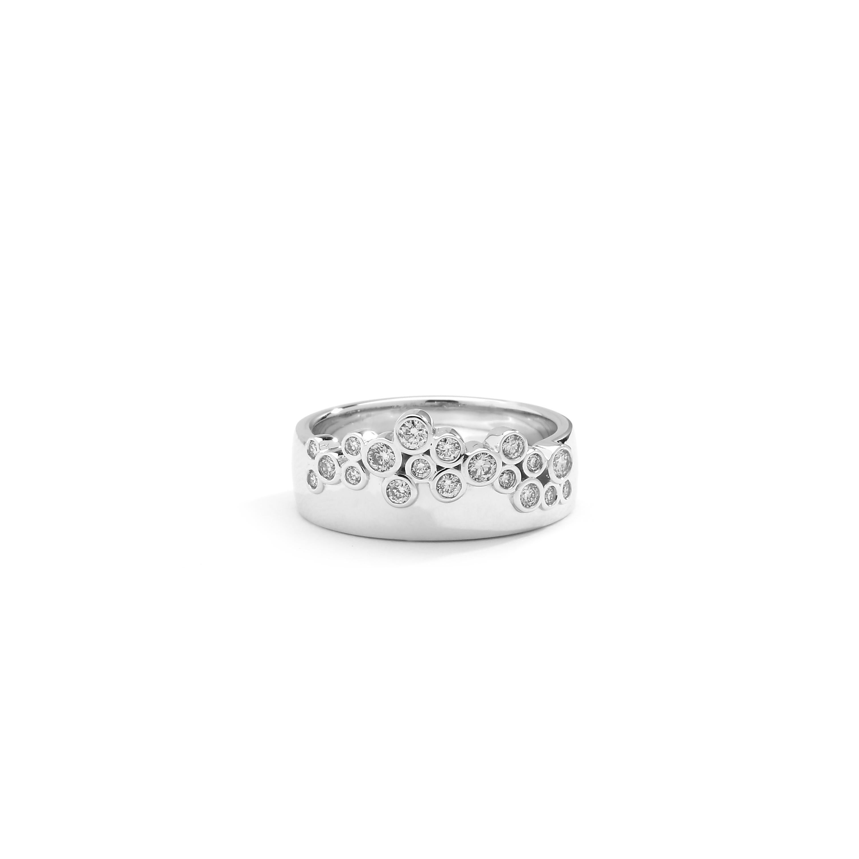 Created in 18 karat white gold
Diamonds 0.35 ct approx
Band size US 6.5 
Limited edition

This exquisite piece is crafted with 18 karat white gold and embodies 0.35 carats of luminous diamonds, providing a timeless elegance. With a captivating band