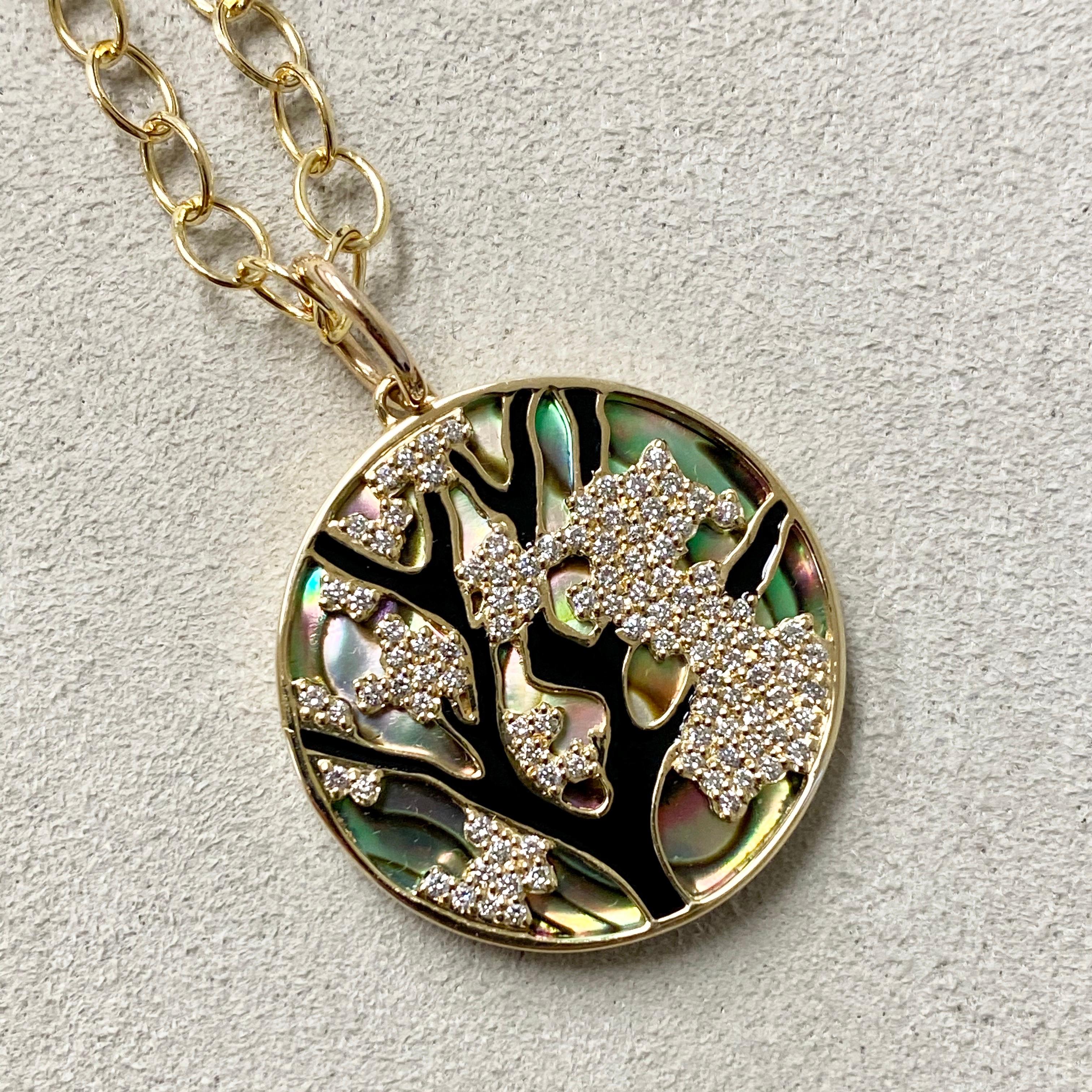 Created in 18 karat yellow gold
Abalone 10.5 cts approx
Champagne diamonds 0.50 ct approx
Cherry blossoms
Chain sold separately
Limited Edition

About the Designers ~ Dharmesh & Namrata

Drawing inspiration from little things, Dharmesh & Namrata