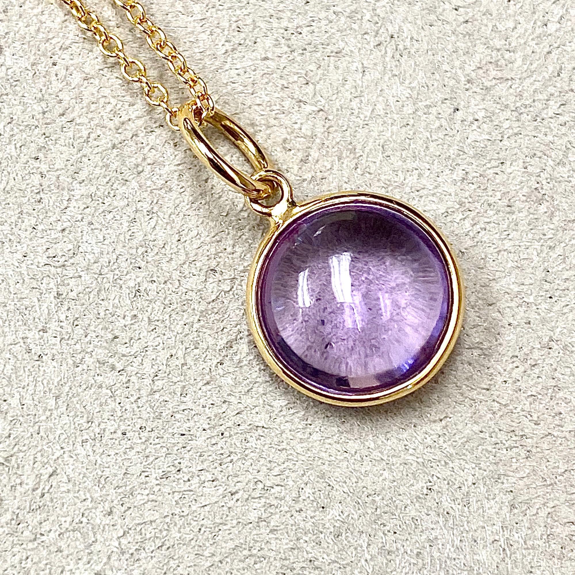 Created in 18 karat yellow gold
10 mm size charm
Amethyst 3.5 cts approx
February birthstone
Chain sold separately 

Crafted from luxurious 18 karat yellow gold, this regal pendant has an impressively large 10 mm size charm. The mesmerizing