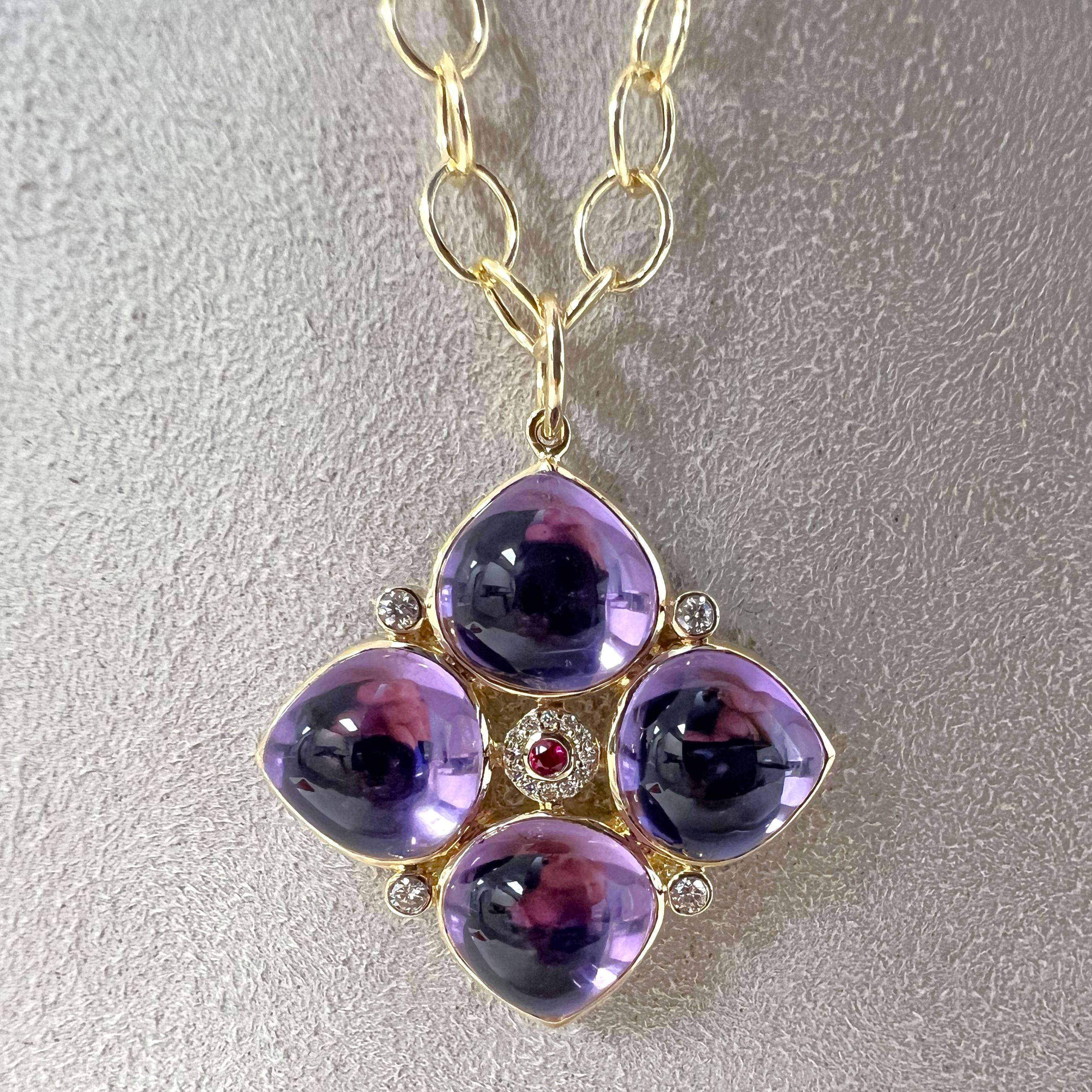 Created in 18 karat yellow gold
Amethyst 23 carats approx.
Ruby 0.05 carat approx.
Diamonds 0.20 carat approx.
Chain sold separately 
Limited edition

Crafted from 18k yellow gold and adorned with 23 carats of Amethyst, a 0.05 carat Ruby, and 0.20