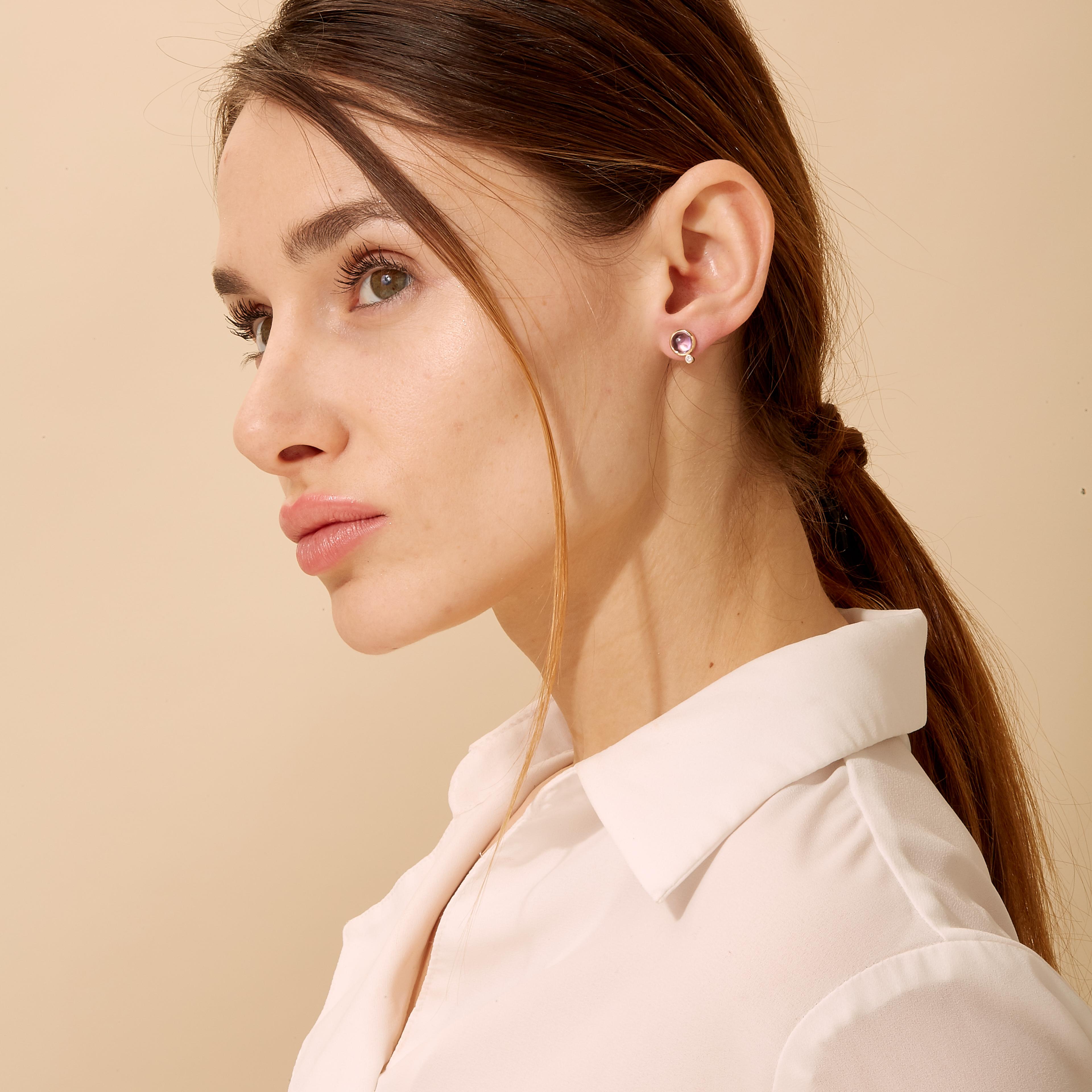 Created in 18 karat yellow gold
Amethyst 2 carats approx.
Diamonds 0.05 carat approx.
Post backs for pierced ears
Limited edition

Handcrafted with 18 karat yellow gold, these limited-edition earrings boast a glamorous amethyst centerpiece weighing