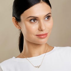 Syna-Anhänger aus Gelbgold mit Diamanten