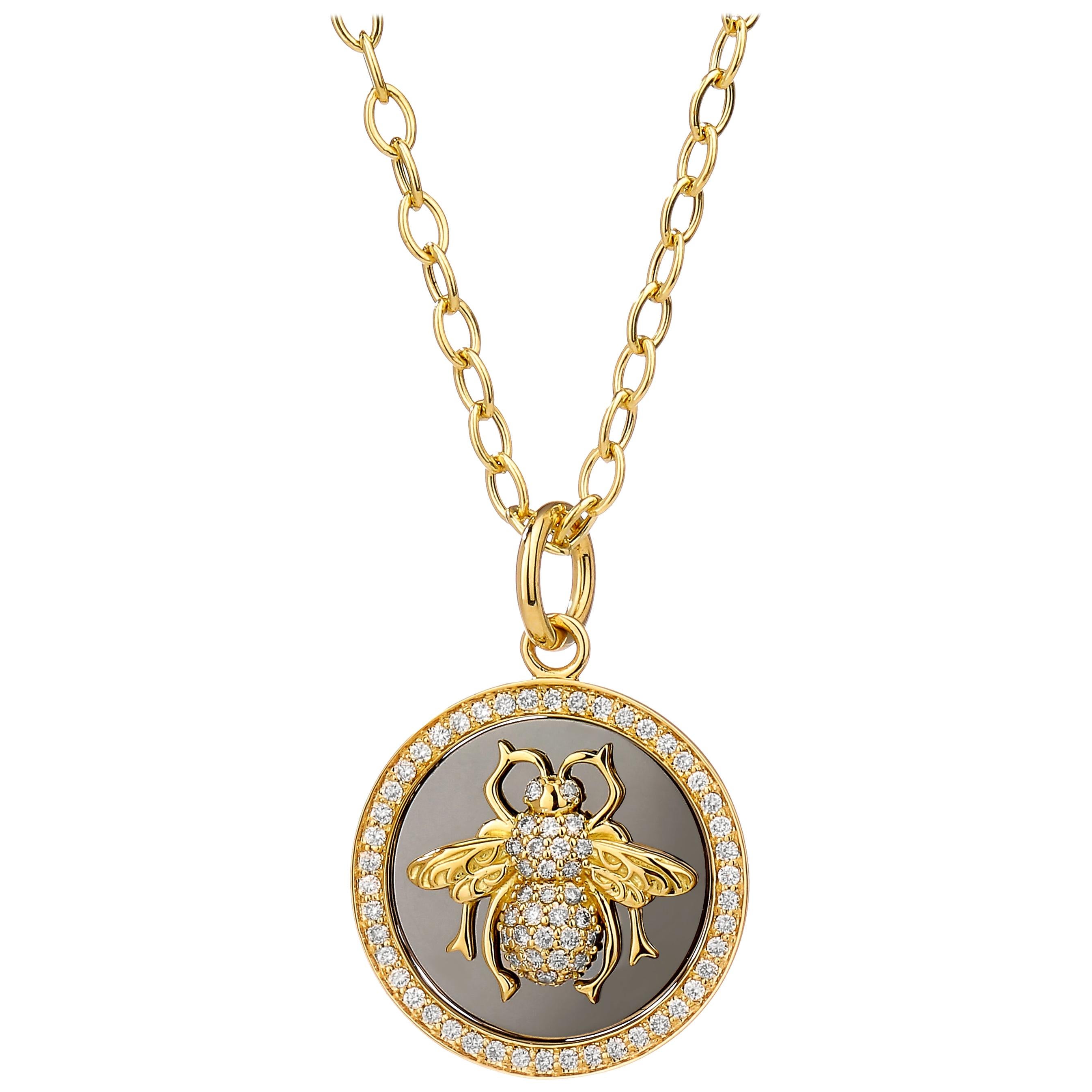 Pendentif abeille Syna en or jaune et argent oxydé avec diamants en vente