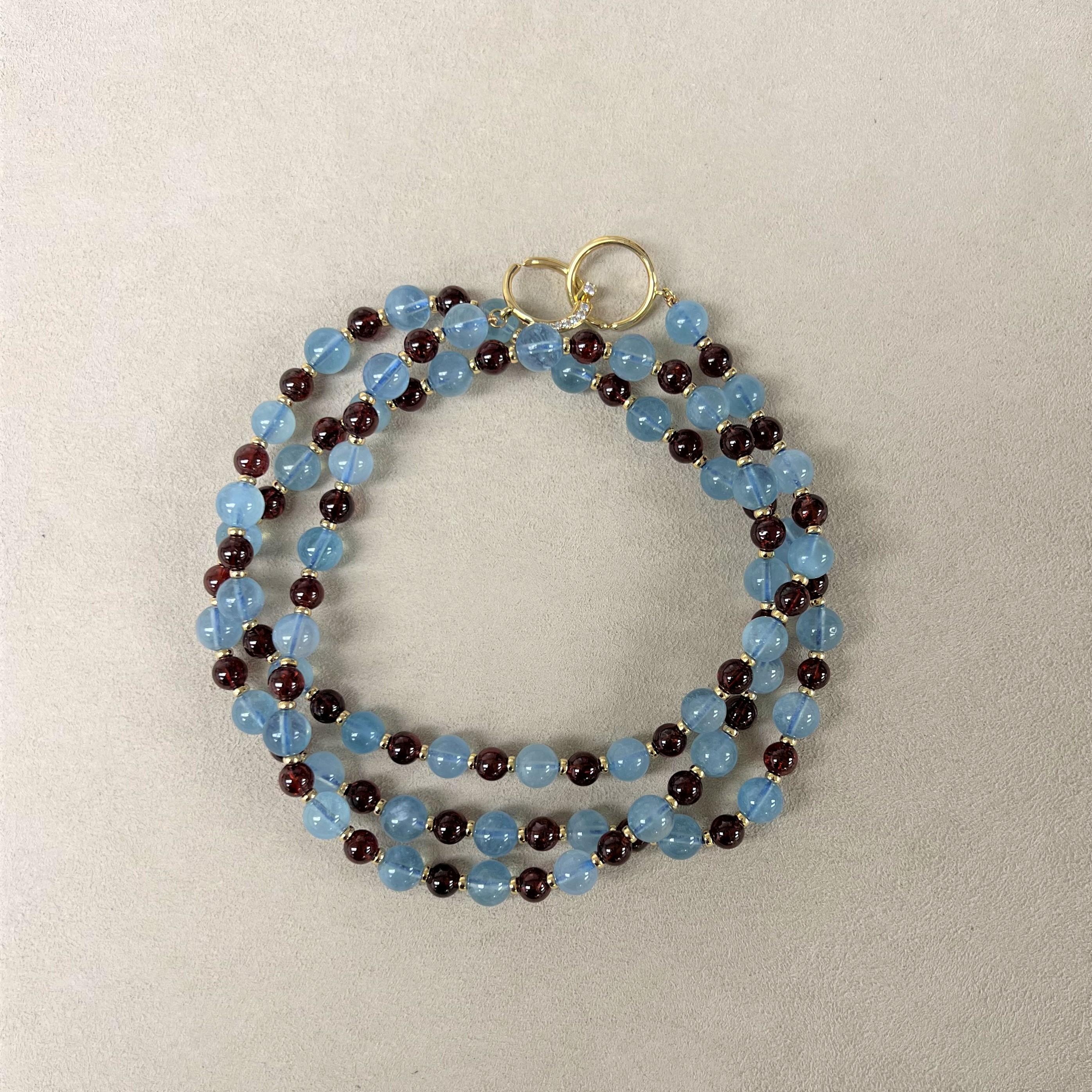 Created in 18 karat yellow gold
36 inch length
Aquamarine 195 carats approx.
Rhodolite Garnet 125 carats approx.
18kyg roundels 
18kyg diamond studded circle clasp
Strung on silk
Limited edition

About the Designers

Drawing inspiration from little