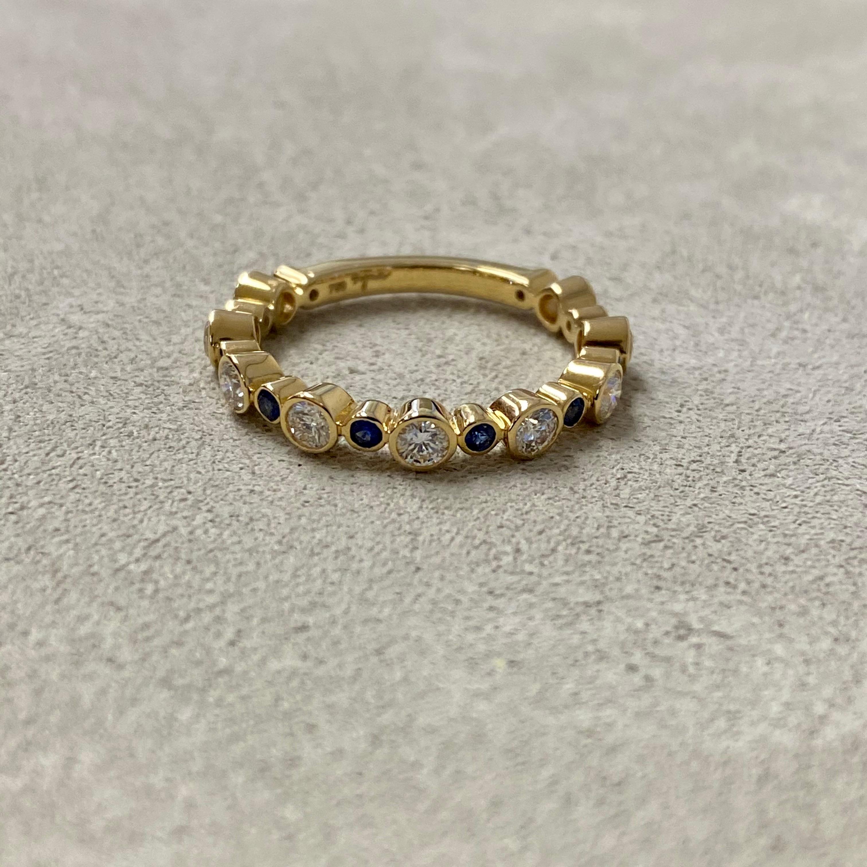 Contemporary Syna Yellow Gold Band with Blue Sapphires and Diamonds For Sale