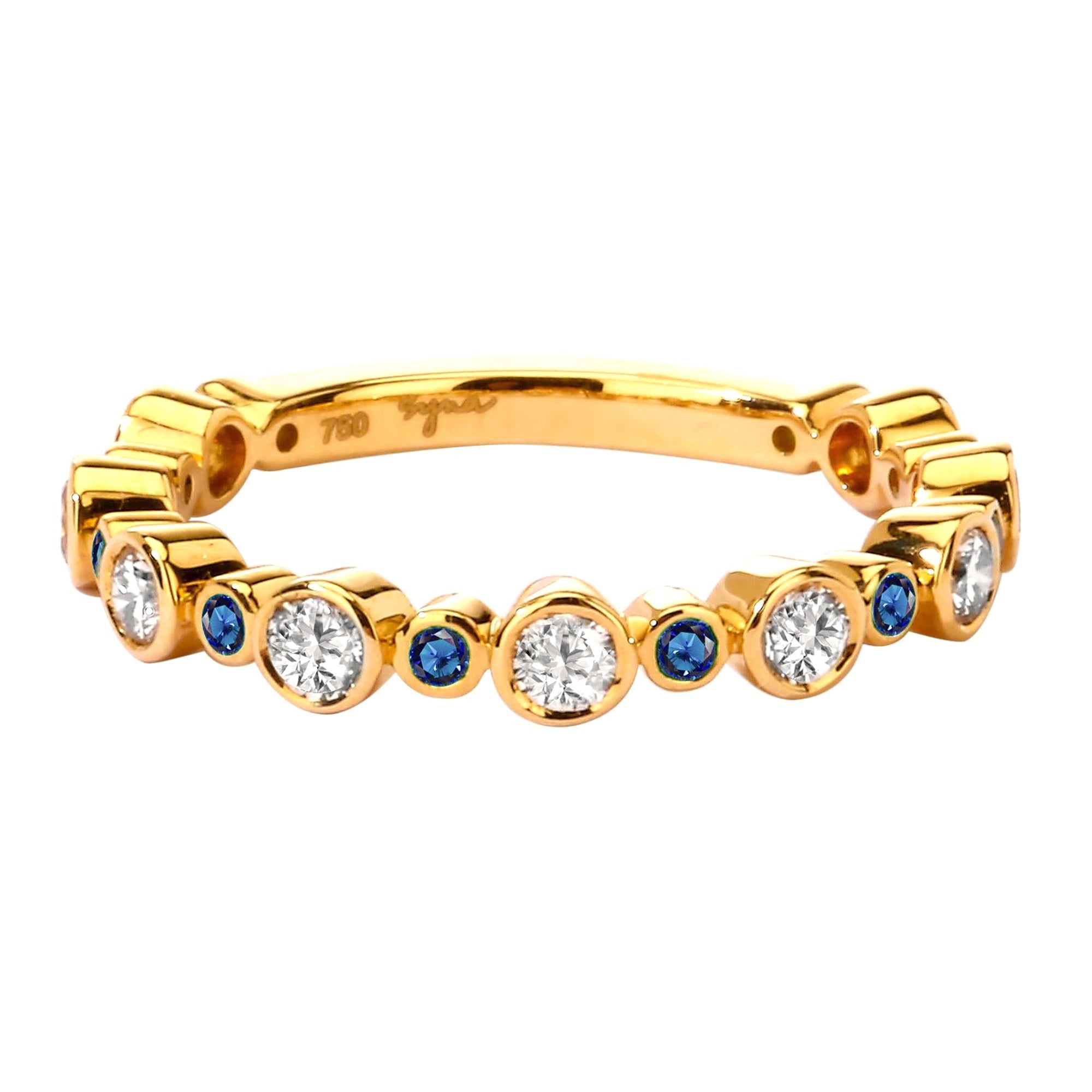 Anillo Syna de Oro Amarillo con Zafiros Azules y Diamantes
