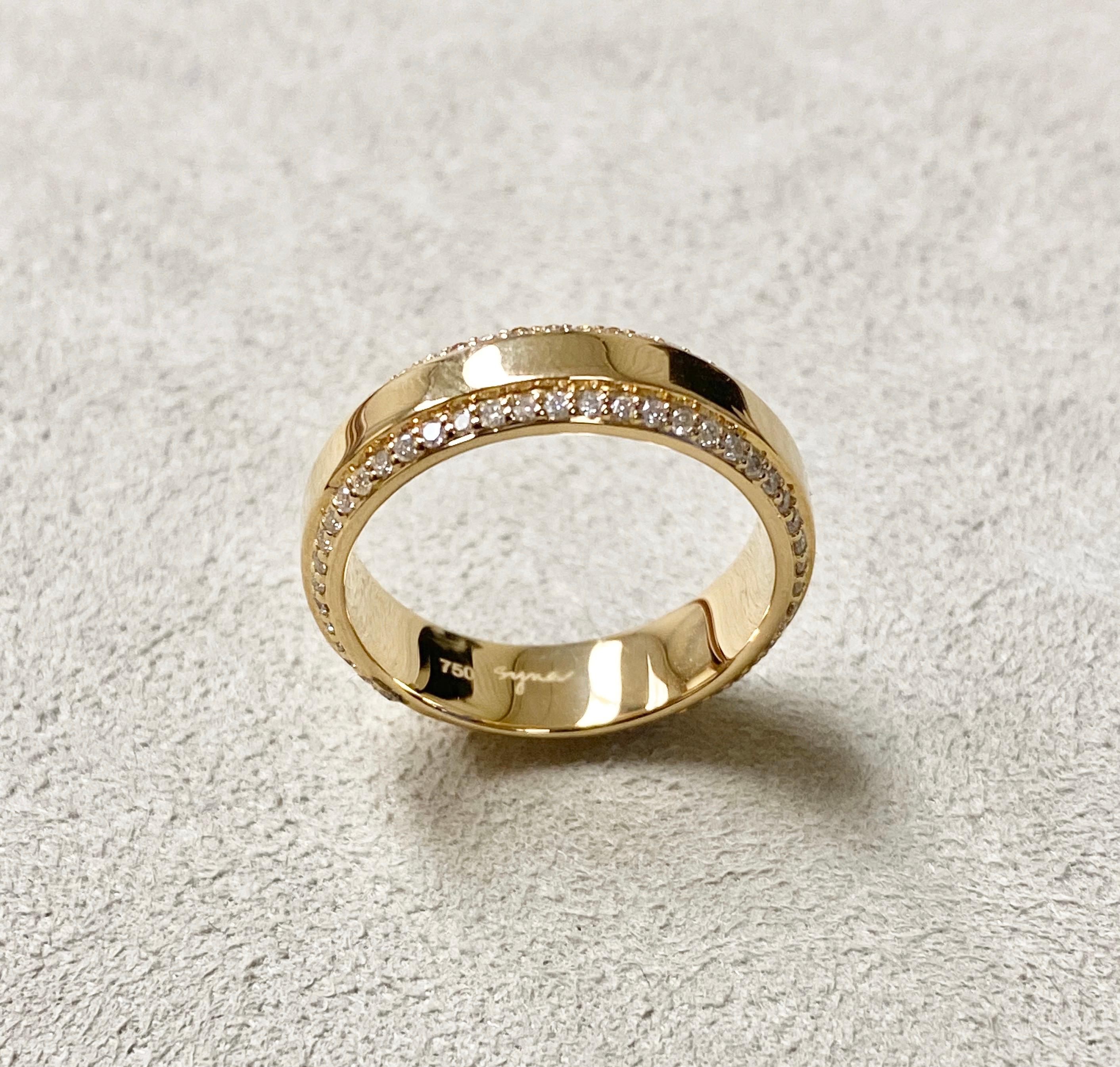 Created in 18 karat yellow gold
Diamonds 0.40 ct approx
Ring size US 6.5, Can be made in other ring sizes on special order

This exquisite ring is crafted in 18-karat yellow gold and features 0.40 ct of diamonds, making it a sight to behold.