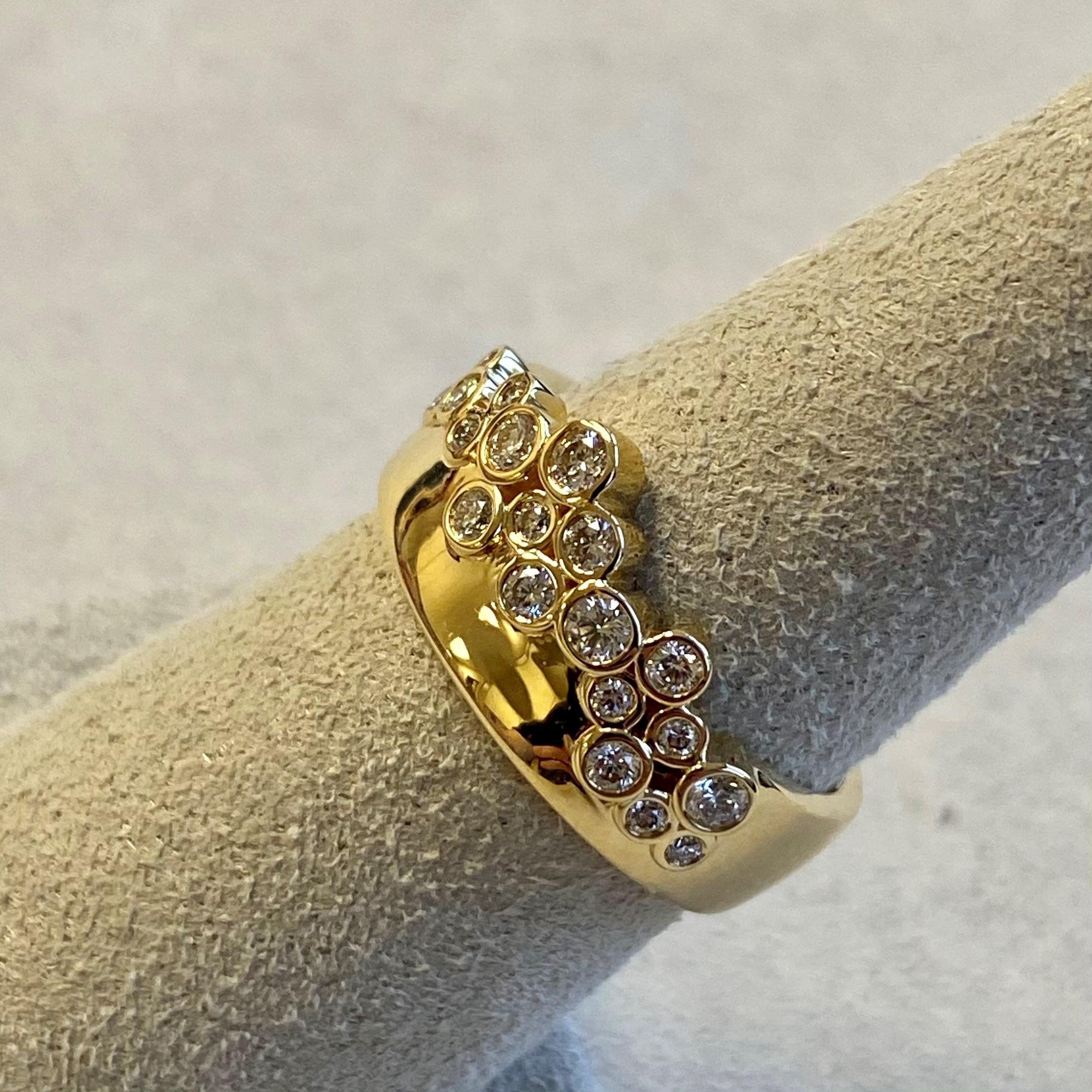 Created in 18 karat yellow gold
Diamonds 0.35 ct approx
Band size US 8
Limited edition

Crafted with 18k yellow gold, this limited-edition ring is studded with 0.35 cts of diamonds and sized to fit a US 8 finger - a luxurious accessory that will be