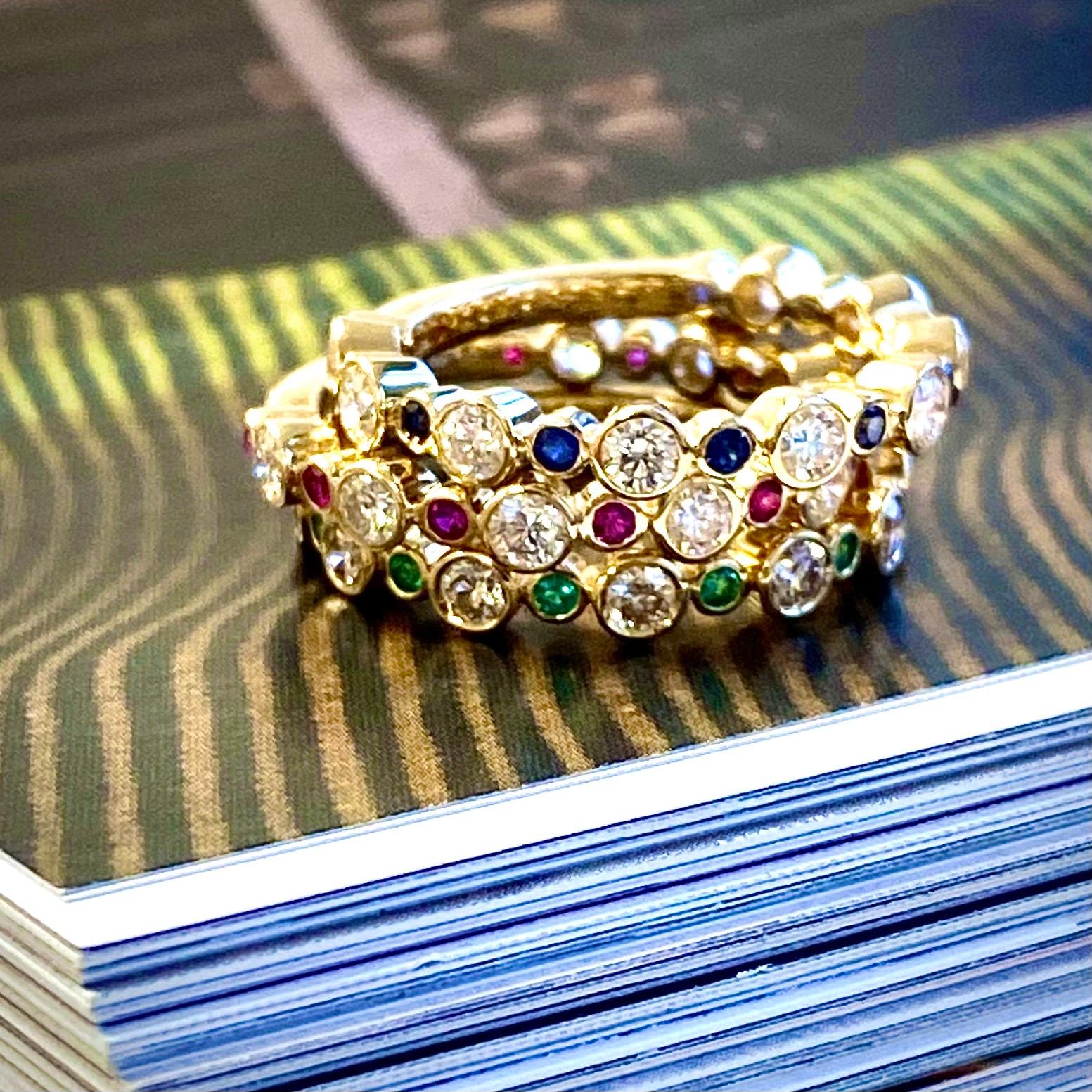 Created in 18 karat yellow gold
Set of three bands
Emerald 0.15 carat approx.
Ruby 0.20 carat approx.
Sapphire 0.20 carat approx.
Diamonds 1.5 carats approx.
Band size US 6.5
Limited edition

Sculpted from 18 karat yellow gold, this limited edition