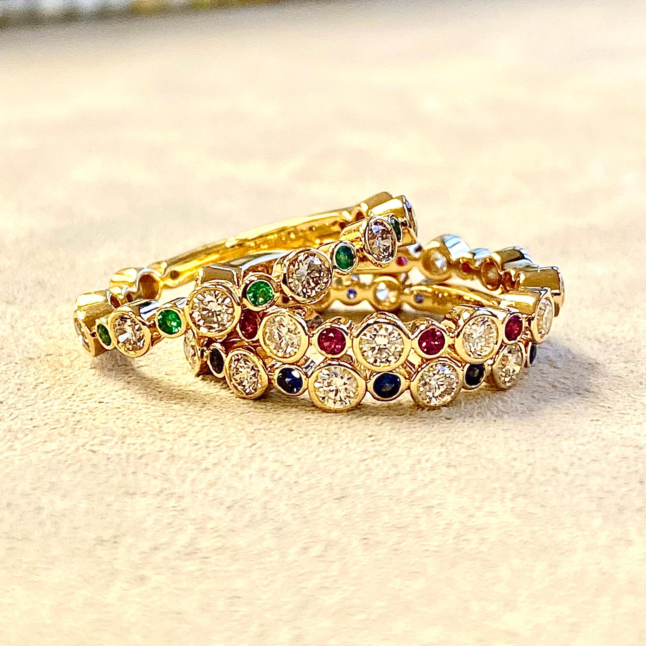 Contemporary Syna Yellow Gold Bands with Emerald, Ruby, Sapphire and Diamonds For Sale