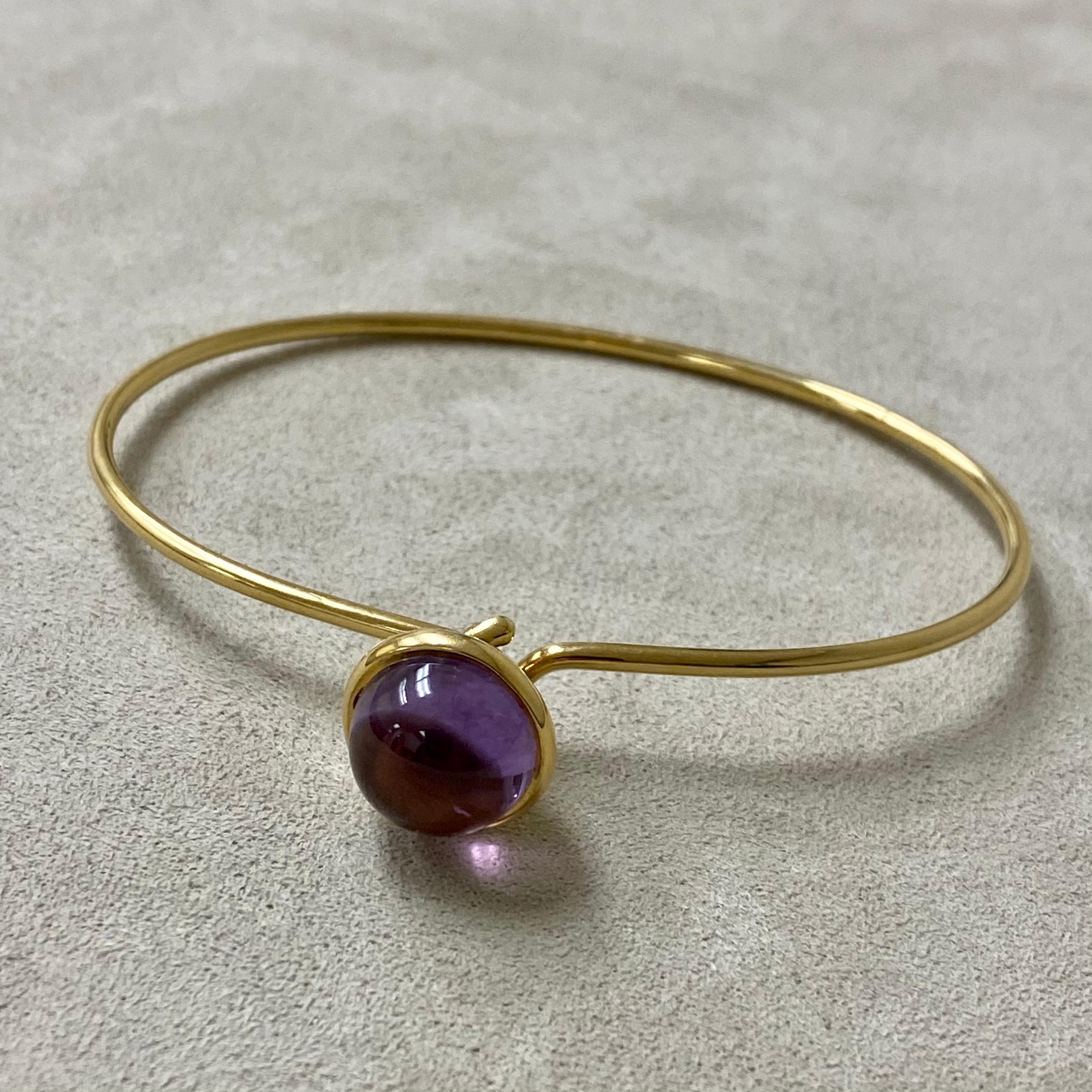 Created in 18kyg
Amethyst 7.5 carats approx.
Openable oval bracelet
Hidden mechanism to open under bauble

Exquisitely fashioned from 18-karat yellow gold, the Candy Large Stacking Baubles Bracelet is adorned with an amethyst of approximatly 7.5