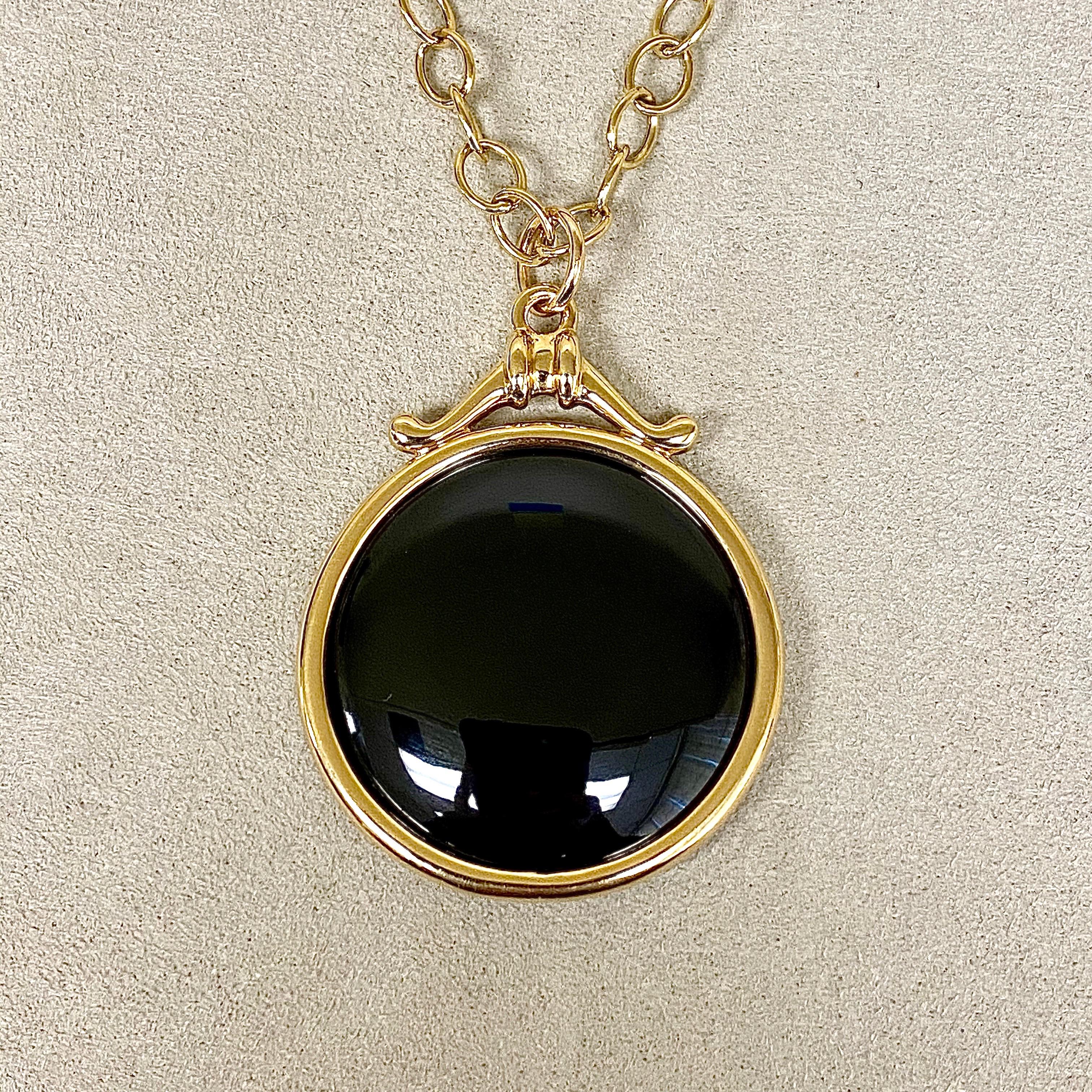 Created in 18 karat yellow gold
Black Spinel 50 cts approx
Chain sold separately
Limited Edition

Envisioned with 18-karat yellow-gold and 50 carats of Black Spinel, this exclusive, limited-edition pendant is a masterpiece. Note: Chain sold