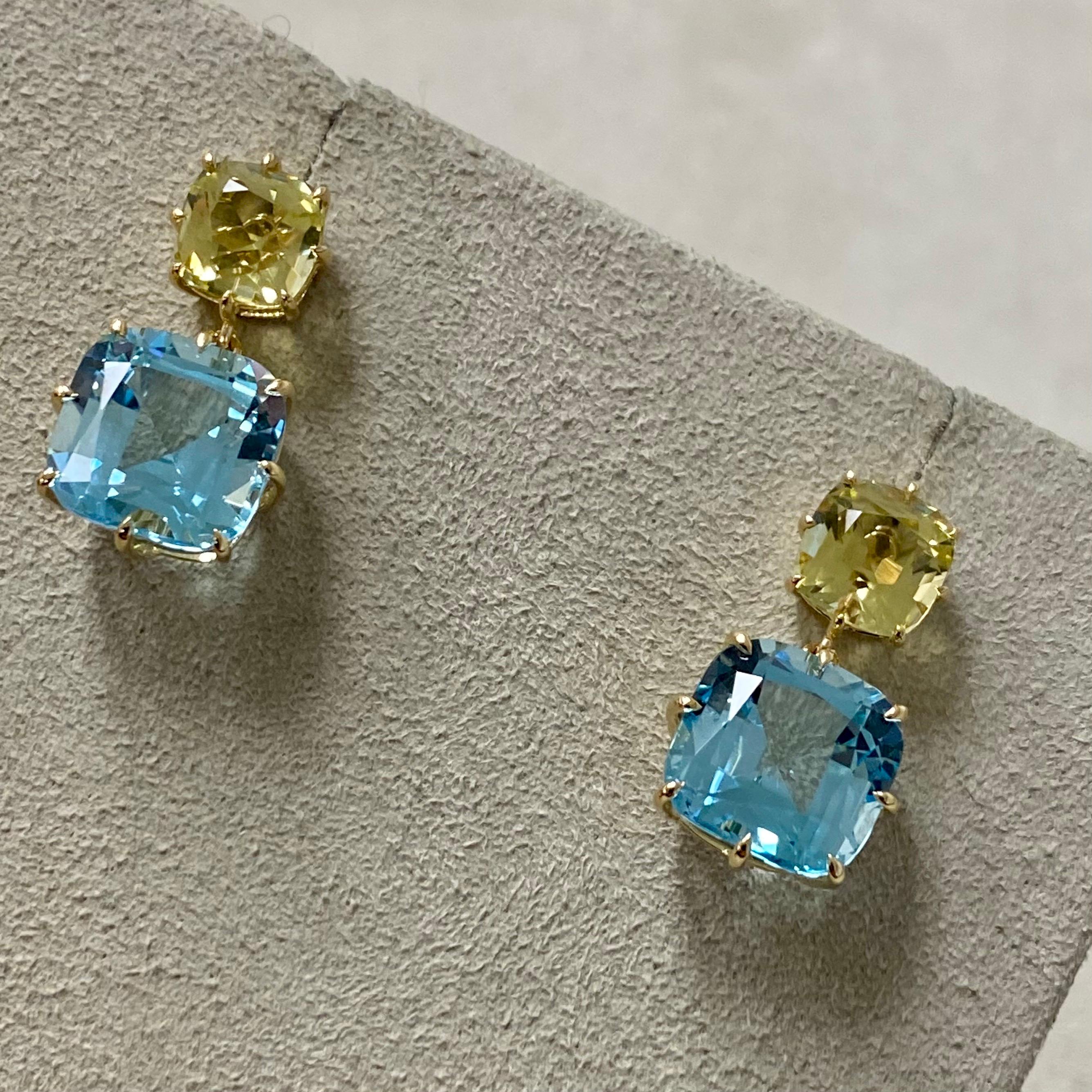Created in 18 karat yellow gold
Lemon Quartz 2.50 carats approx.
Blue Topaz 11 carats approx.
Post backs for pierced ears
Limited Edition

Crafted from 18 karat golden alloy, these limited edition earrings showcase 2.50 carats of glittering lemon