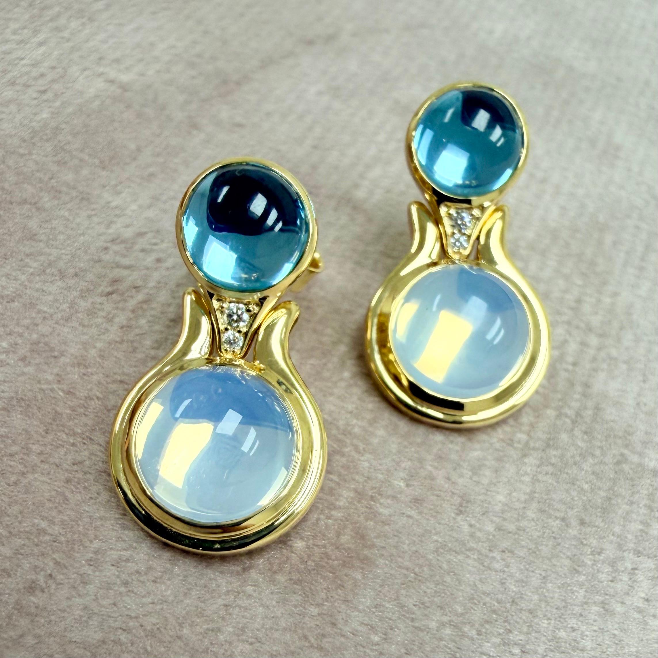 Créé en or jaune 18 carats
Quartz lunaire 4 carats environ
Topaze bleue 3 carats environ
Diamants 0,03 carat environ
Dos de papillon 18kyg
Édition limitée


Exquises en or jaune 18 carats, ces boucles d'oreilles en édition limitée sont composées de