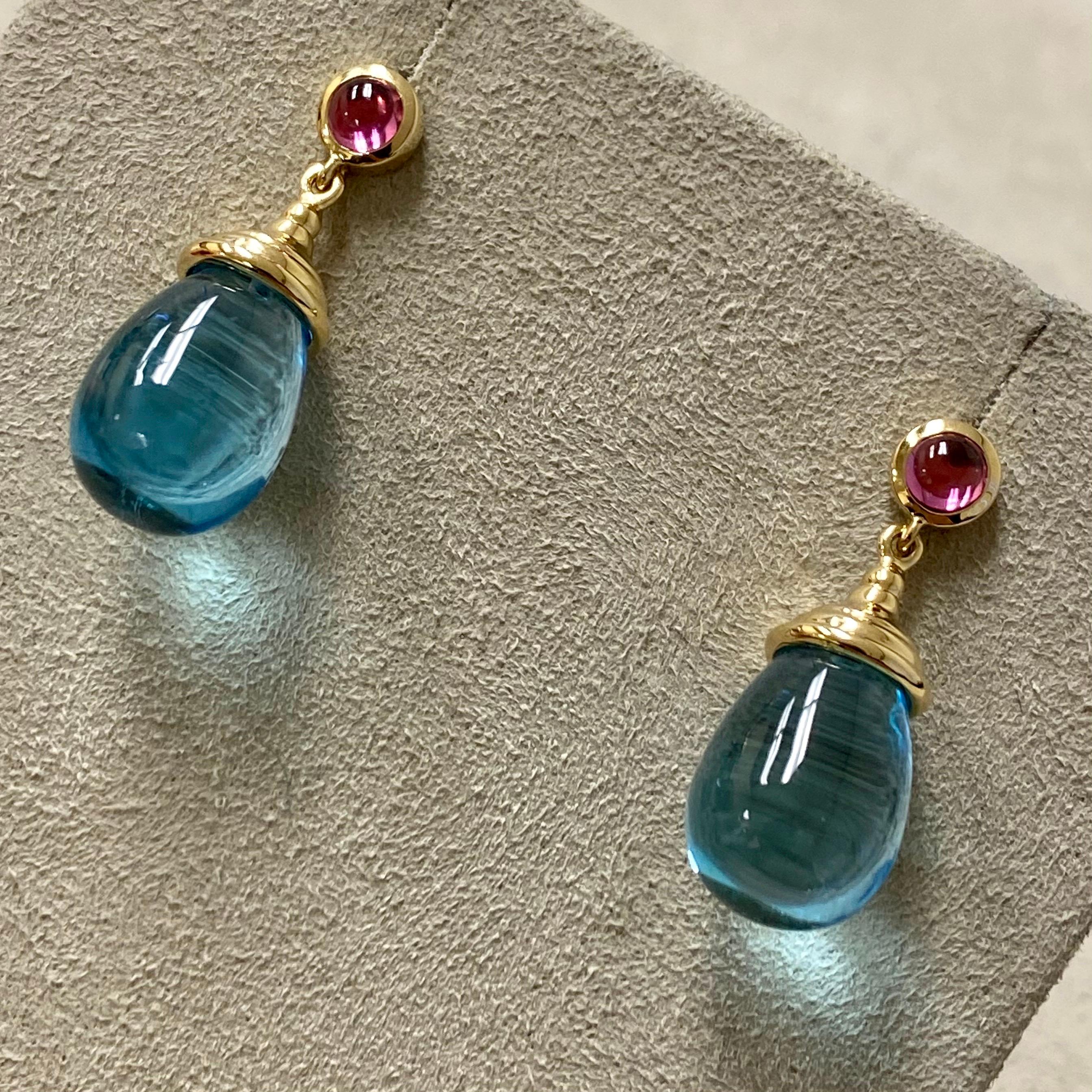 Created in 18 karat yellow gold
Blue Topaz Drops 25 carats approx.
Rubellite cabochons 0.50 carat approx.
18kyg butterfly backs

About the Designers ~ Dharmesh & Namrata

Drawing inspiration from little things, Dharmesh & Namrata Kothari have