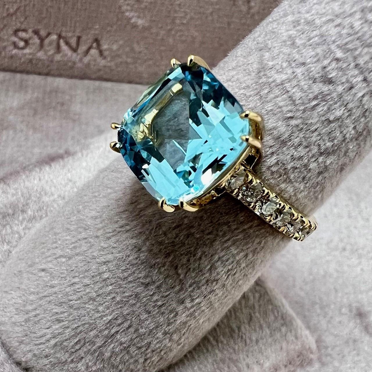 Created in 18 karat yellow gold
Blue Topaz 5 carats approx.
Diamonds 0.80 carat approx.
Ring size US 6.5, can be sized
Limited edition


About the Designers ~ Dharmesh & Namrata

Drawing inspiration from little things, Dharmesh & Namrata Kothari