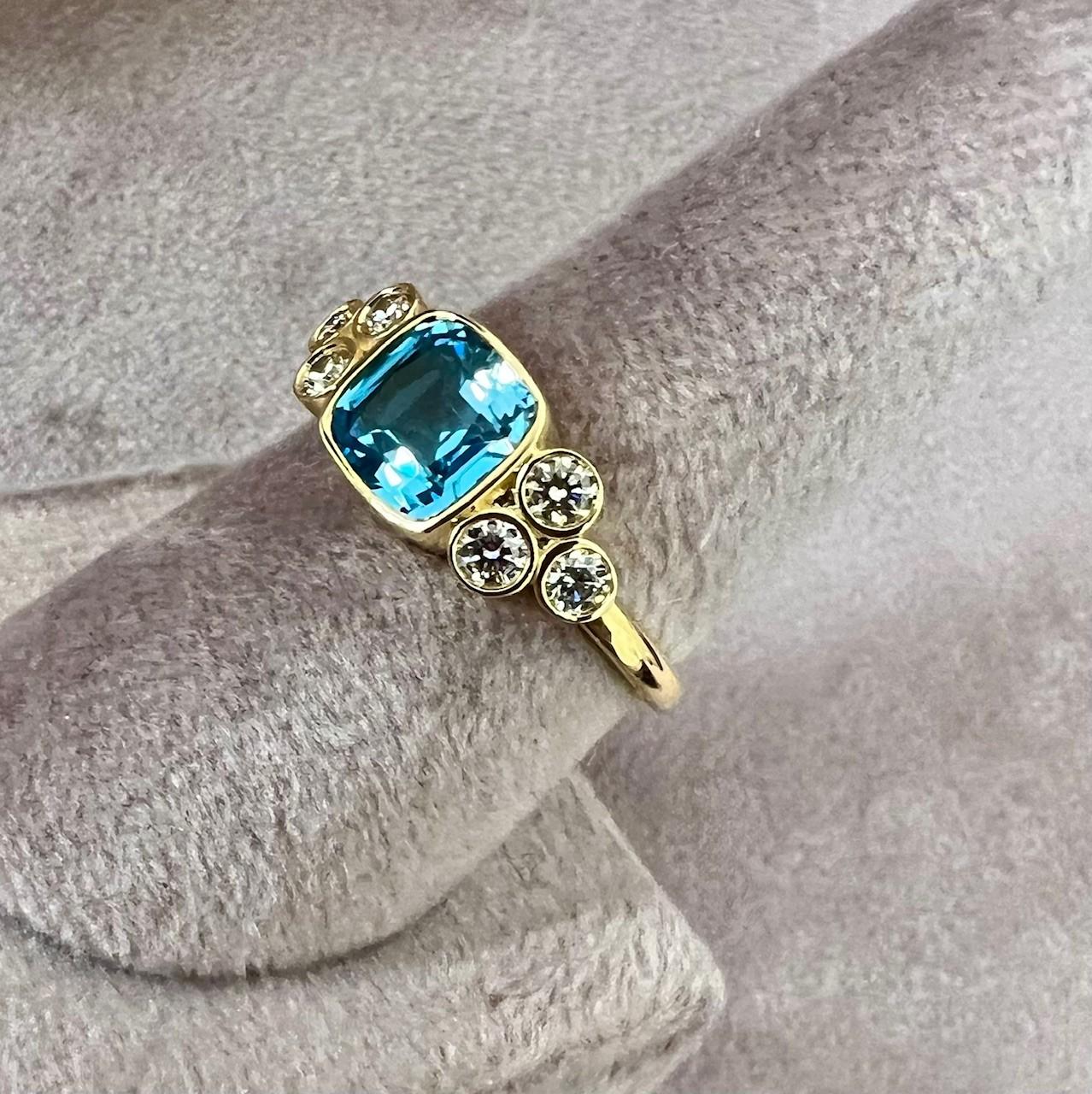 Contemporary Syna Yellow Gold Blue Topaz Cushion Ring with Diamonds For Sale