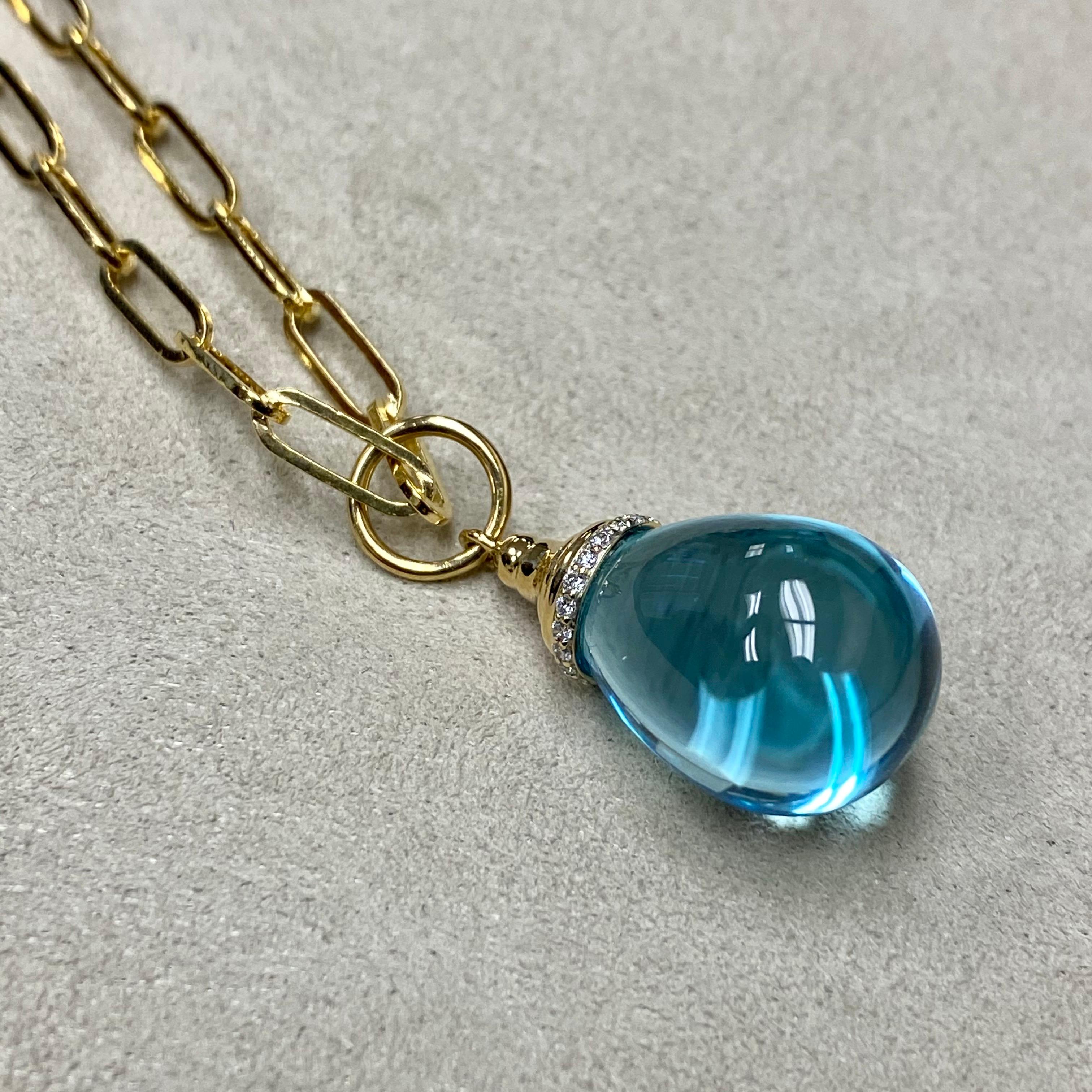 Created in 18 karat yellow gold 
Blue Topaz 20 carats minimum
Diamonds 0.10 carat approx.
Chain sold separately

Exquisitely crafted from 18-karat yellow gold, this captivating pendant features a stunning Blue Topaz of no less than 20 carats, plus