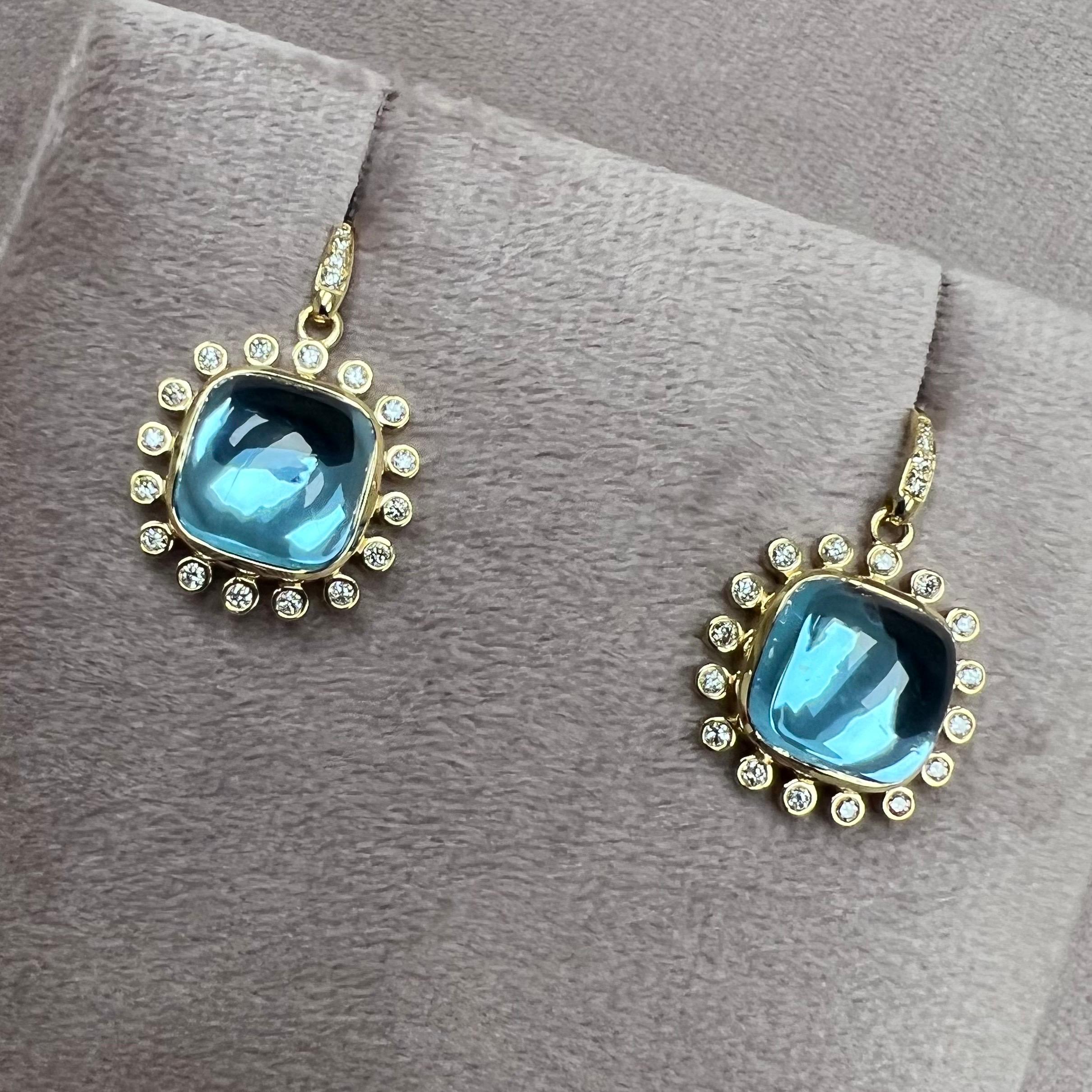 Hergestellt aus 18 Karat Gelbgold
Blauer Topas, ca. 14 Karat.
Diamanten ca. 0,35 Karat.
Französischer Draht für durchstochene Ohren



Über die Designer

Dharmesh & Namrata Kothari haben sich von kleinen Dingen inspirieren lassen und eine