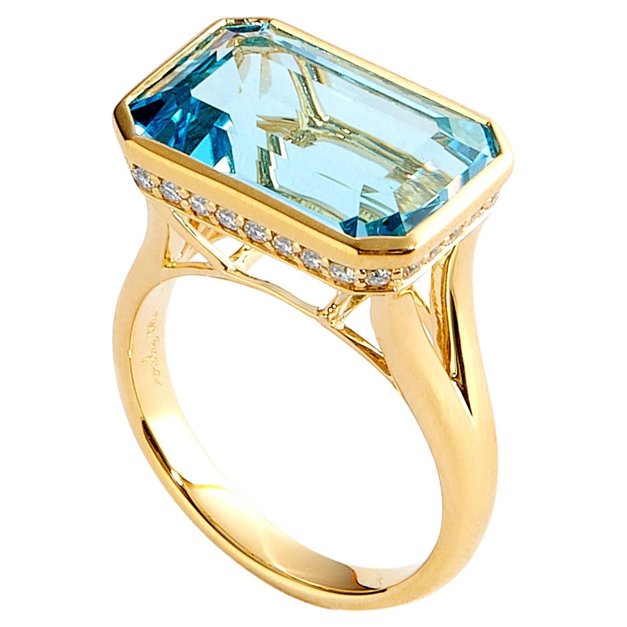 Syna Bague géométrique en or jaune avec topaze bleue et diamants en vente