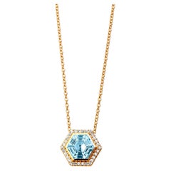 Syna Collier hexagonal en or jaune et topaze bleue avec diamants