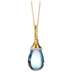 Syna Mini collier goutte en or jaune et topaze bleue avec diamants