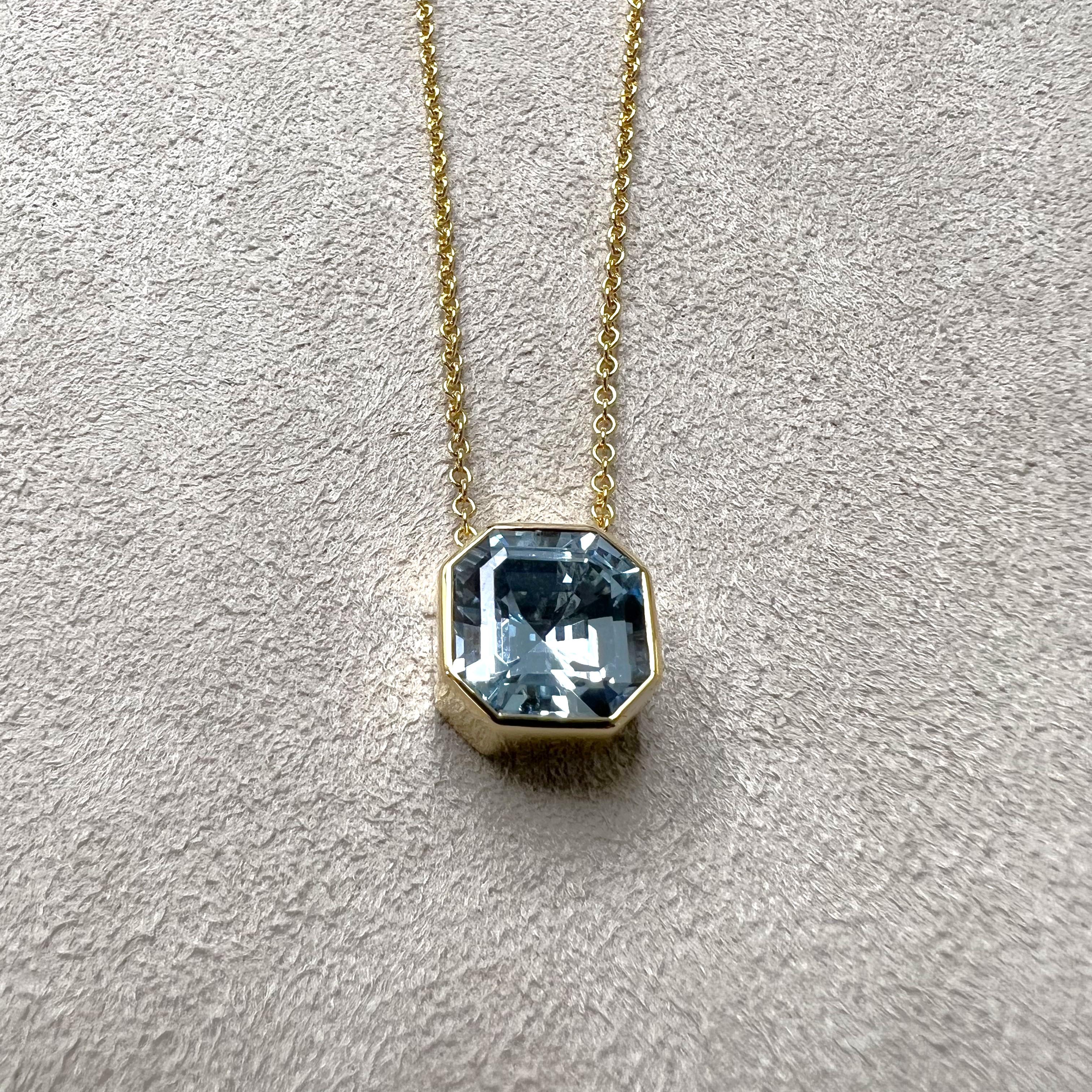 Created in 18 karat yellow gold
Blue Topaz 5 carats approx.
18 inch necklace with loops at 16 and 17 inch
Lobster lock

 About the Designers ~ Dharmesh & Namrata

Drawing inspiration from little things, Dharmesh & Namrata Kothari have created an