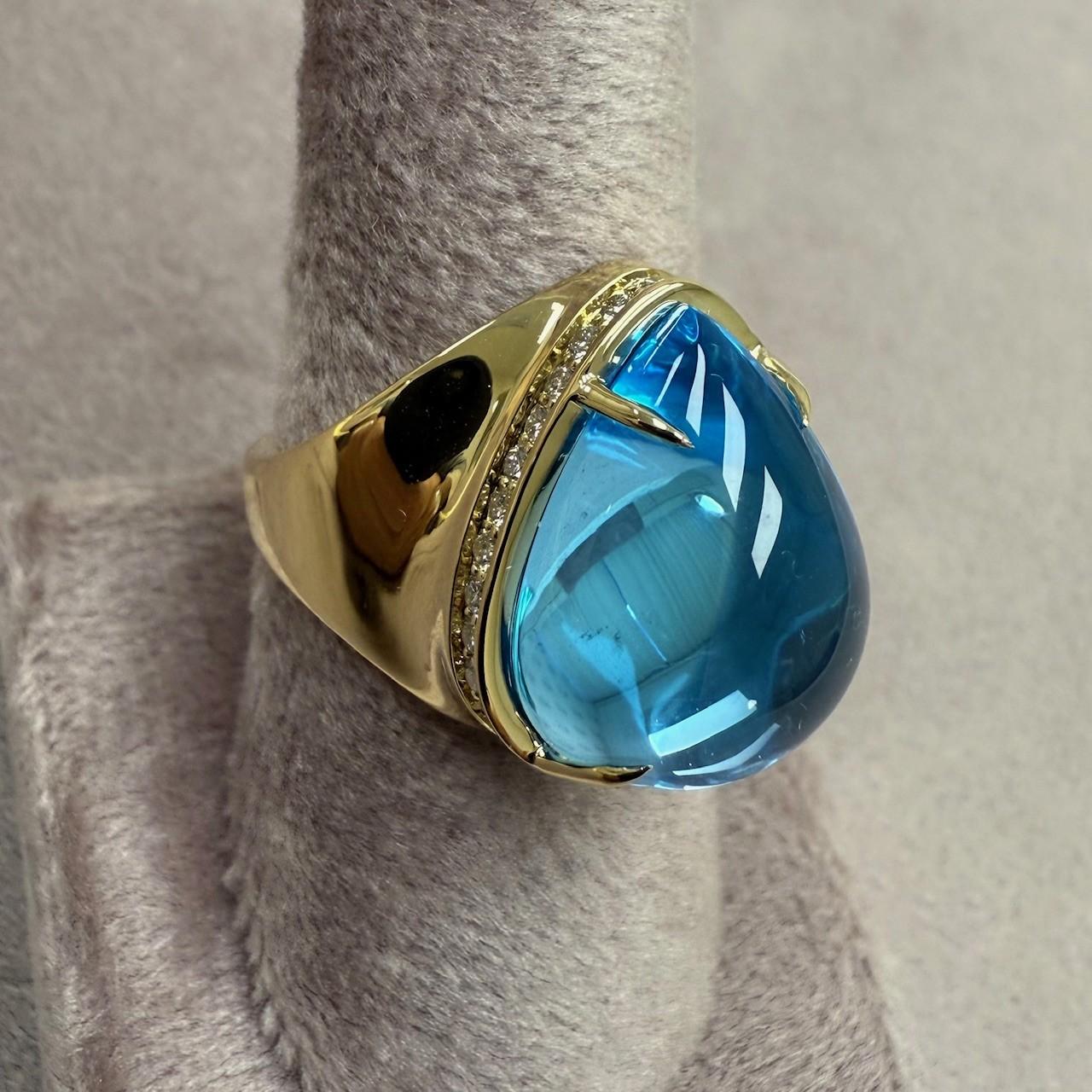 Contemporary Syna Yellow Gold Blue Topaz Pear Shaped Ring with Diamonds For Sale