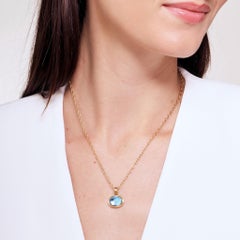 Syna Yellow Gold Blue Topaz Pendant Necklace