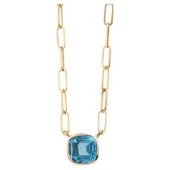 Syna Yellow Gold Blue Topaz Pendant Necklace