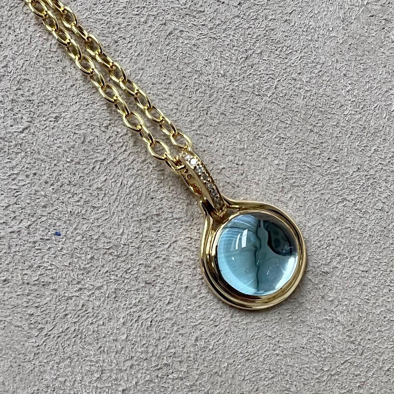 Created in 18 karat yellow gold
Blue topaz 6 carats approx.
Champagne diamonds 0.05 carat approx.
Limited edition
Chain sold separately

 About the Designers ~ Dharmesh & Namrata

Drawing inspiration from little things, Dharmesh & Namrata Kothari
