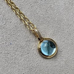 Syna Yellow Gold Blue Topaz Pendant with Champagne Diamonds
