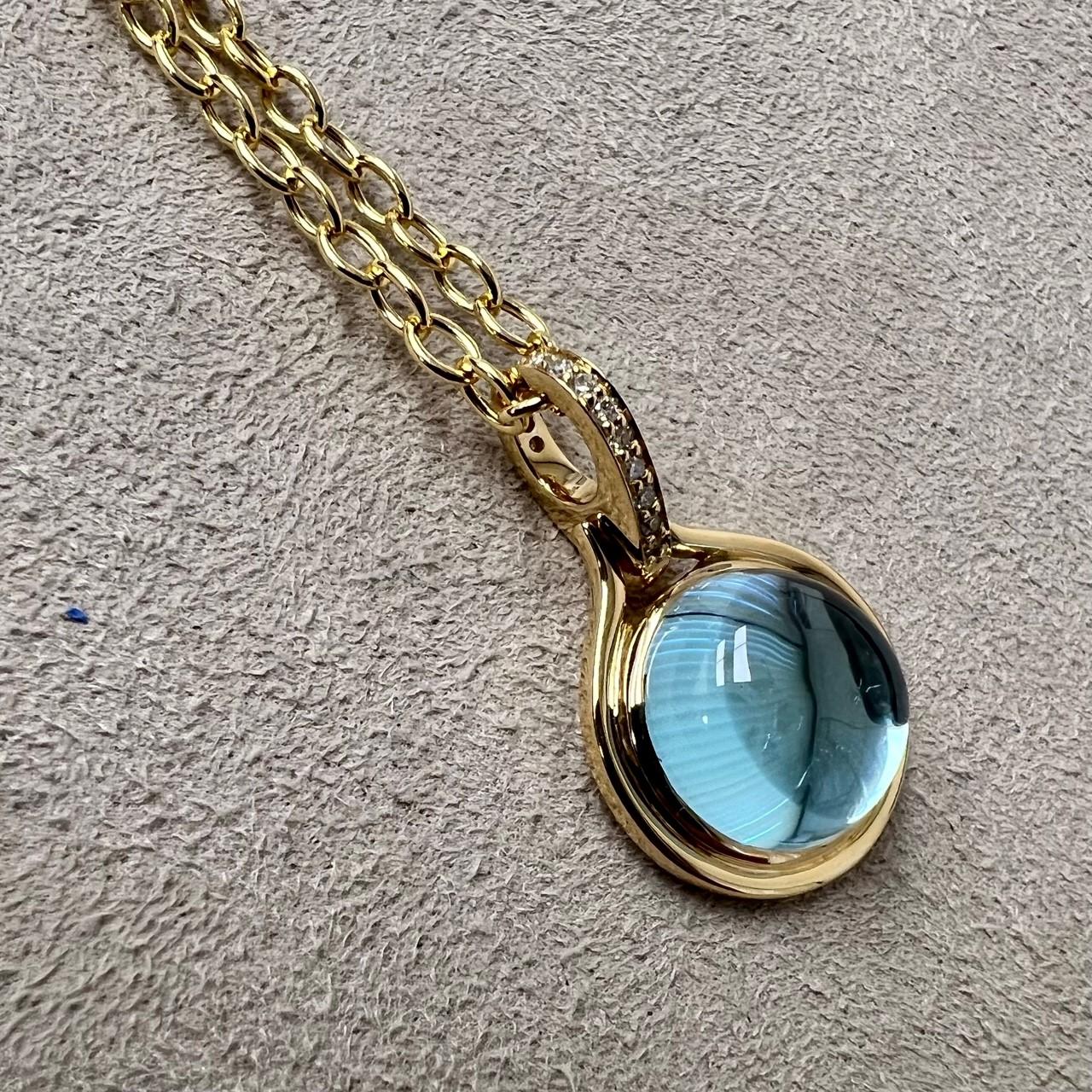 Contemporary Syna Yellow Gold Blue Topaz Pendant with Champagne Diamonds For Sale