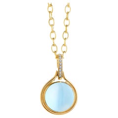 Syna Yellow Gold Blue Topaz Pendant with Champagne Diamonds