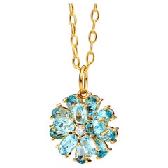 Syna Yellow Gold Blue Topaz Pendant with Champagne Diamonds