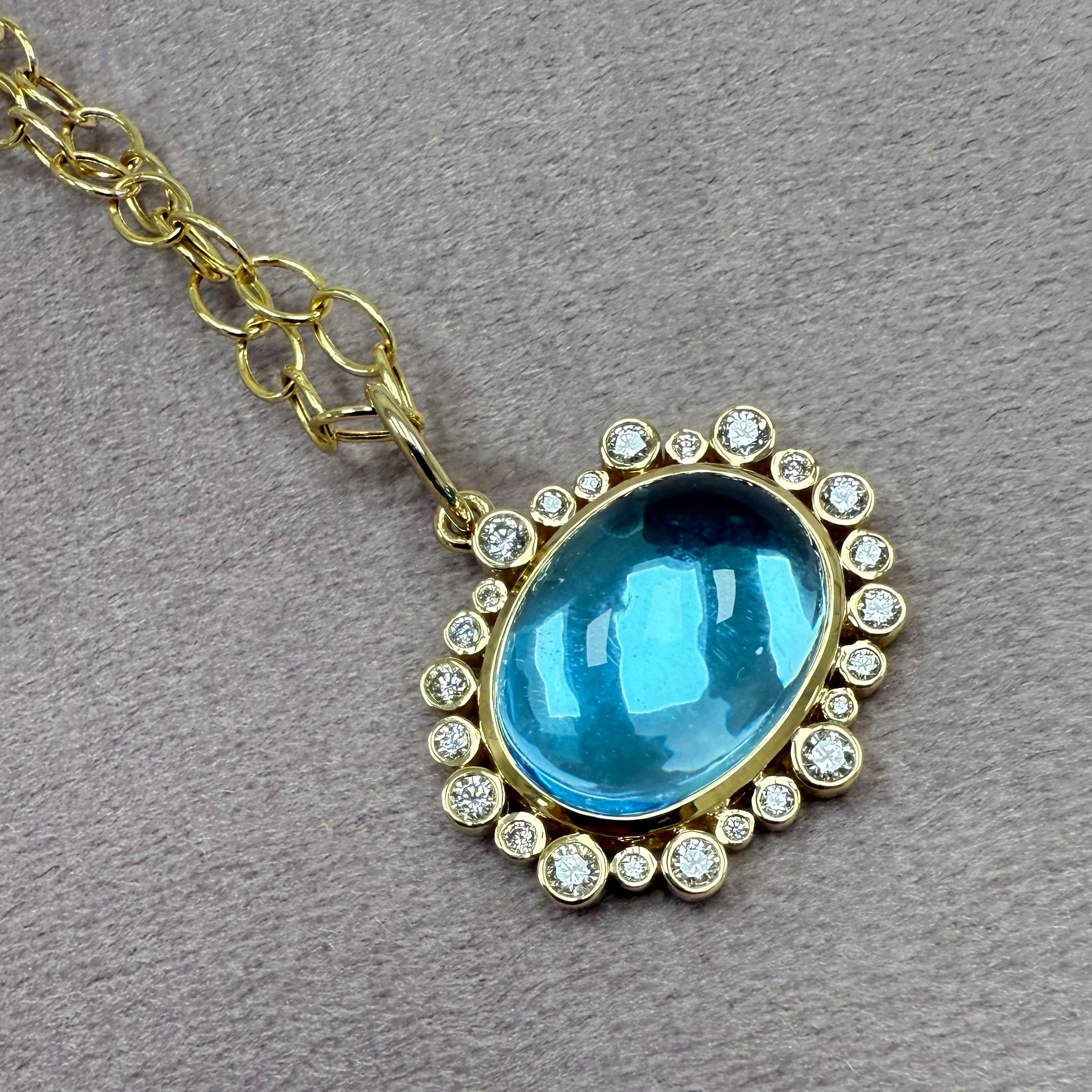 Created in 18 karat yellow gold
Blue Topaz 14.70 carats approx.
Diamonds 0.50 carats approx.
Chain sold separately

 About the Designers ~ Dharmesh & Namrata

Drawing inspiration from little things, Dharmesh & Namrata Kothari have created an