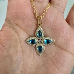 Syna Yellow Gold Blue Topaz Pendant with Diamonds