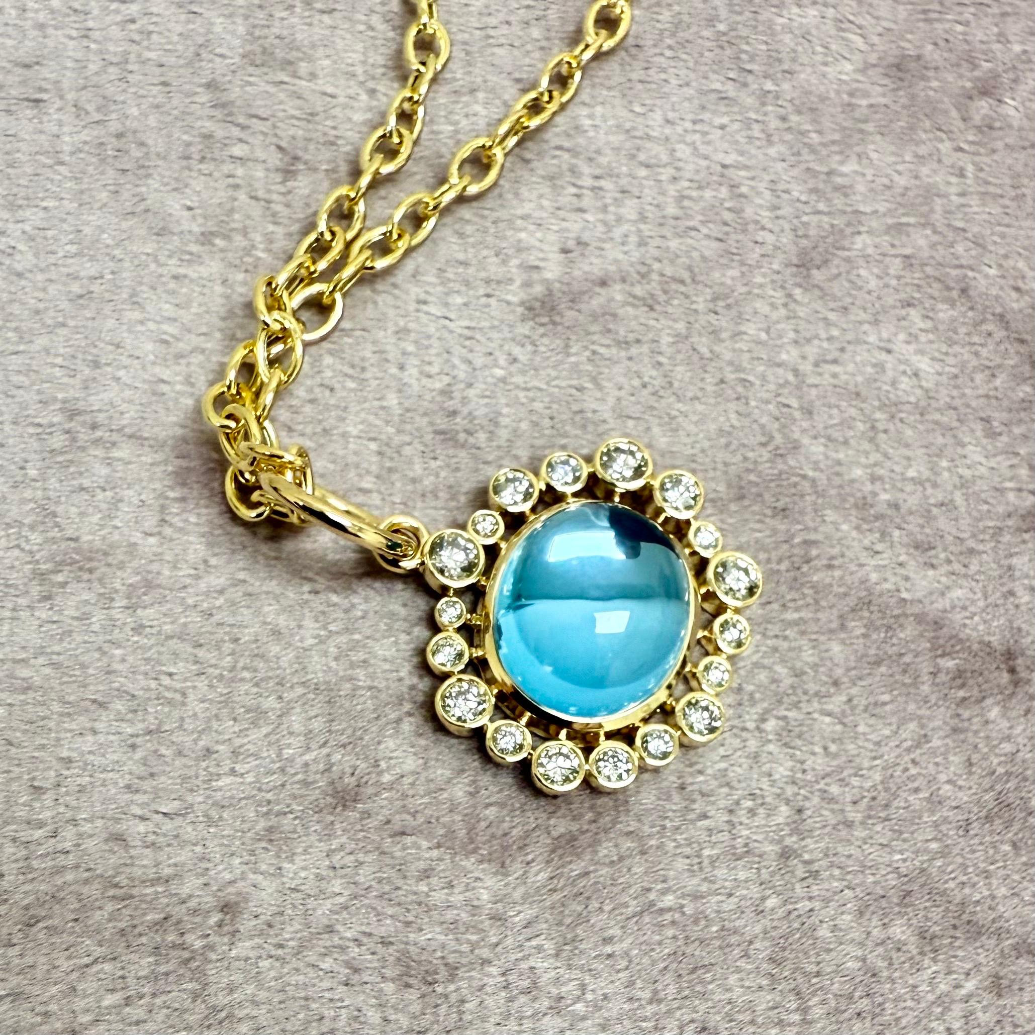 Contemporary Syna Yellow Gold Blue Topaz Pendant with Diamonds For Sale