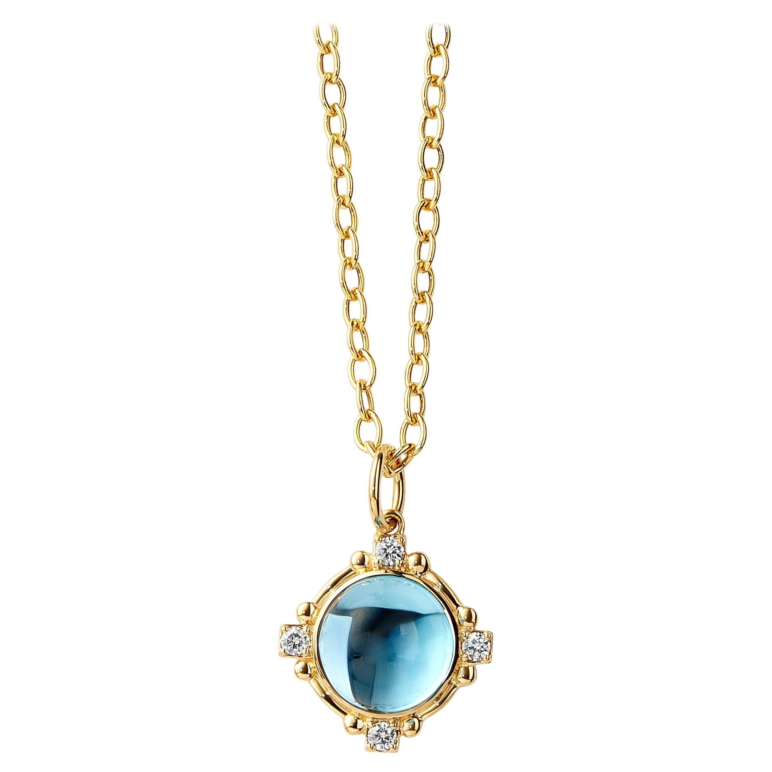 Colgante de oro amarillo Syna de topacio azul con diamantes