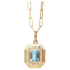 Syna Yellow Gold Blue Topaz Pendant with Diamonds