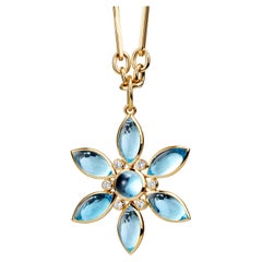 Pendentif Syna en or jaune et topaze bleue avec diamants