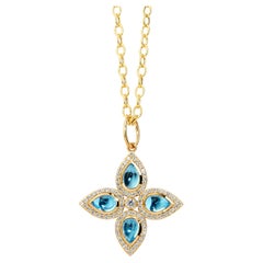 Pendentif Syna en or jaune et topaze bleue avec diamants