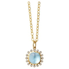 Syna Yellow Gold Blue Topaz Pendant with Diamonds