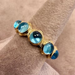 Bague en or jaune Syna Topaze bleue