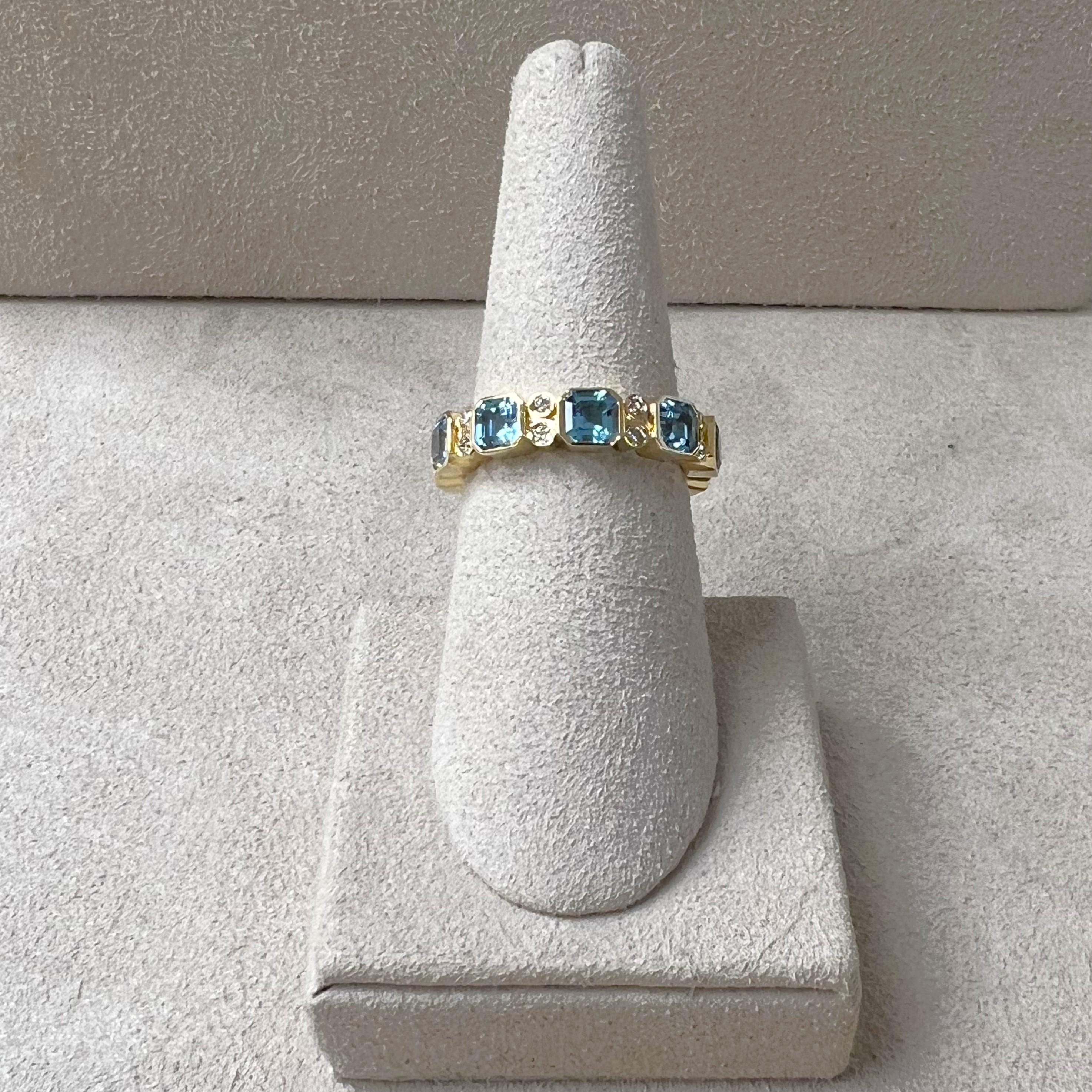 Created in 18 karat yellow gold
Blue topaz 2.50 carats approx.
Diamonds 0.20 carat approx.
Ring size US 7, can be sized
Limited edition

Skilfully crafted from 18 karat yellow gold, this limited edition ring features a 2.50 blue topaz gemstone and