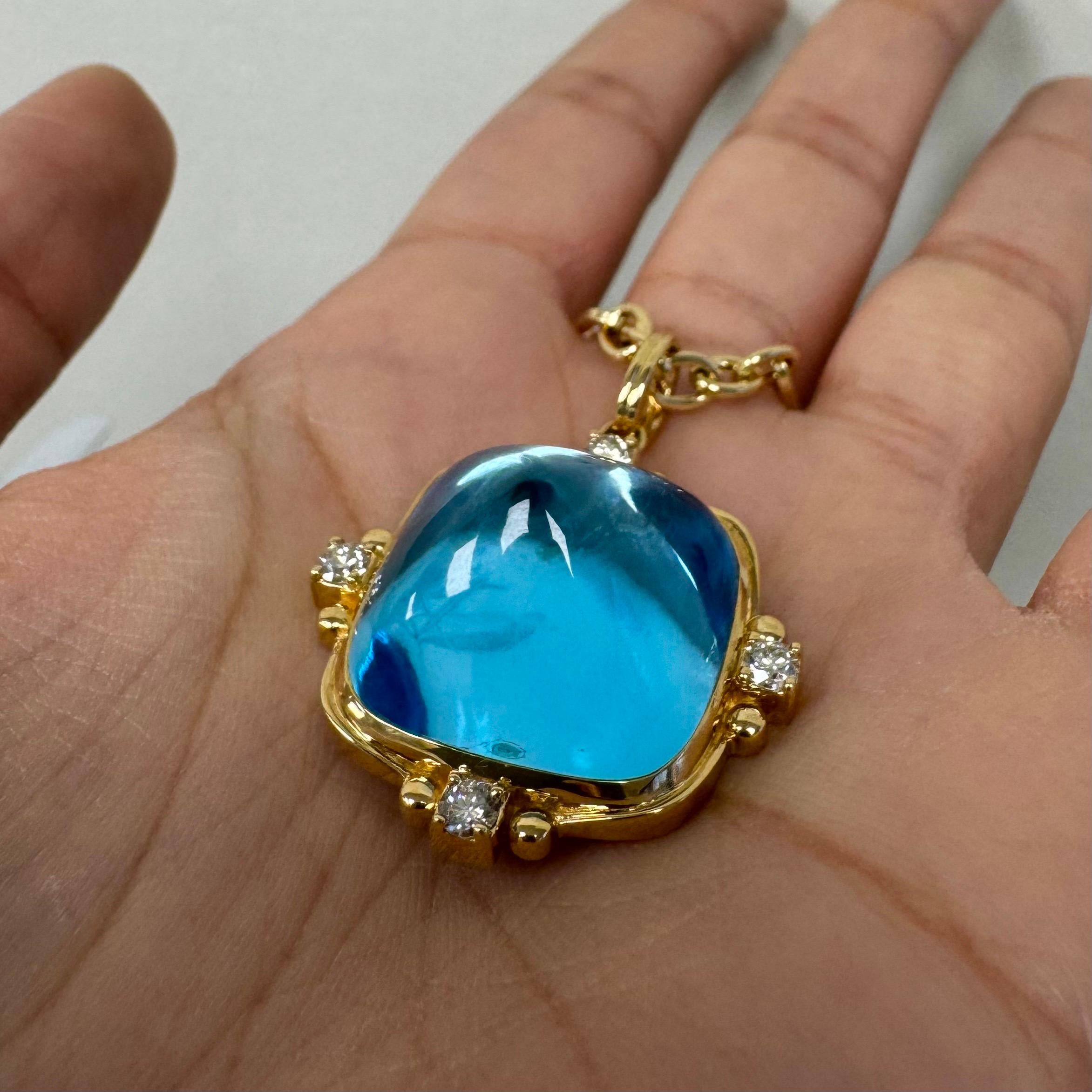 Created in 18 karat yellow gold
Blue Topaz 45 carats approx.
Diamonds 0.40 carat approx.
Chain sold separately



 About the Designers ~ Dharmesh & Namrata

Drawing inspiration from little things, Dharmesh & Namrata Kothari have created an