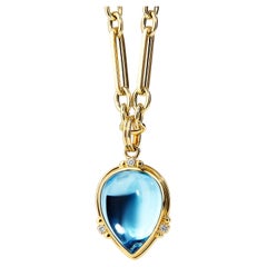 Syna Yellow Gold Blue Topaz Tear Drop Pendant with Diamonds