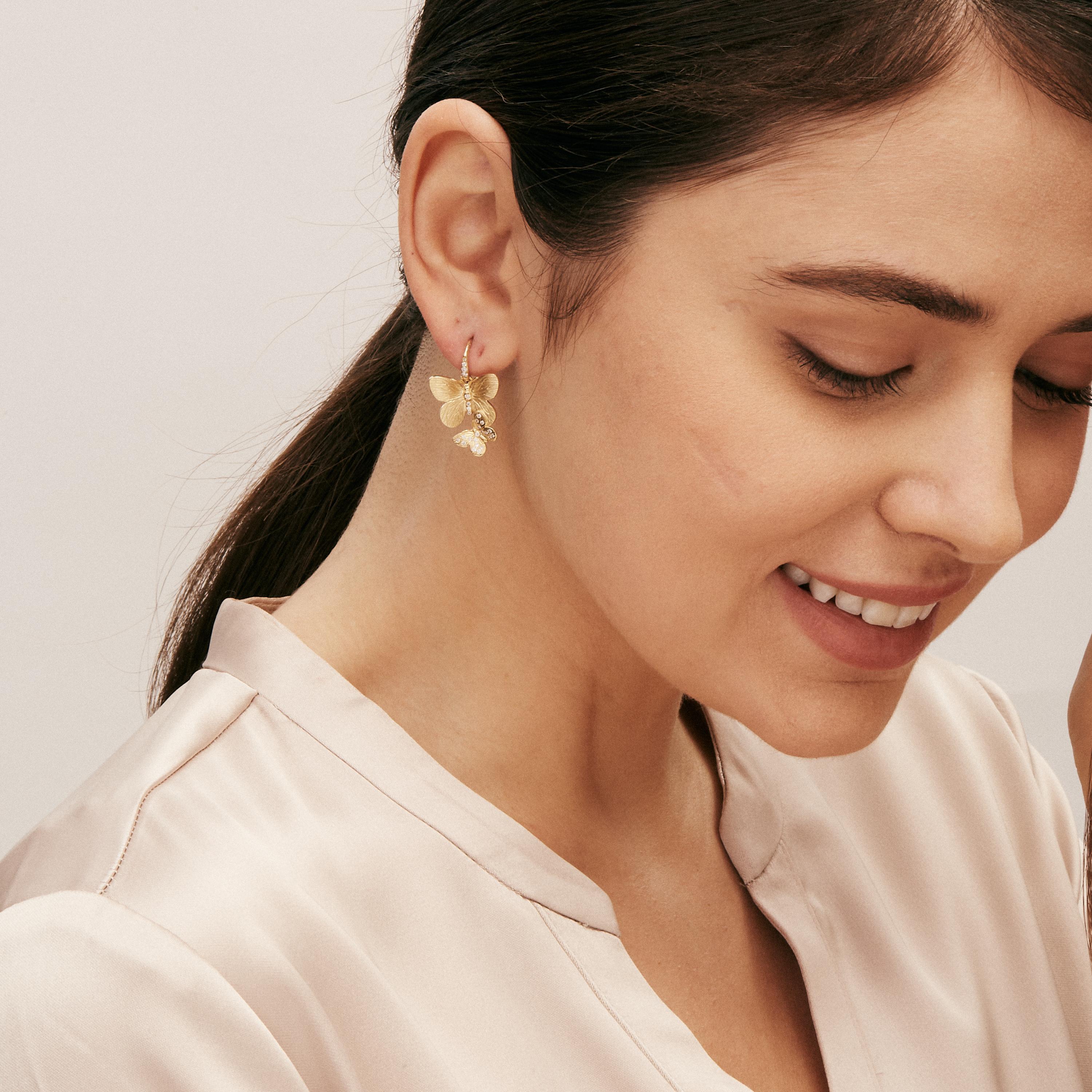 Created in 18 karat yellow gold
Diamonds 0.30 carat approx.
French wire for pierced ears
Limited edition

Exquisitely crafted in 18 karat yellow gold, these limited-edition earrings flaunt diamonds of approximately 0.30 carats, secured on French