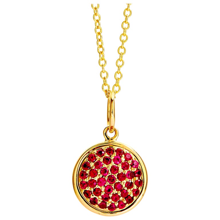 Syna Yellow Gold Chakra Pendant with Rubies For Sale