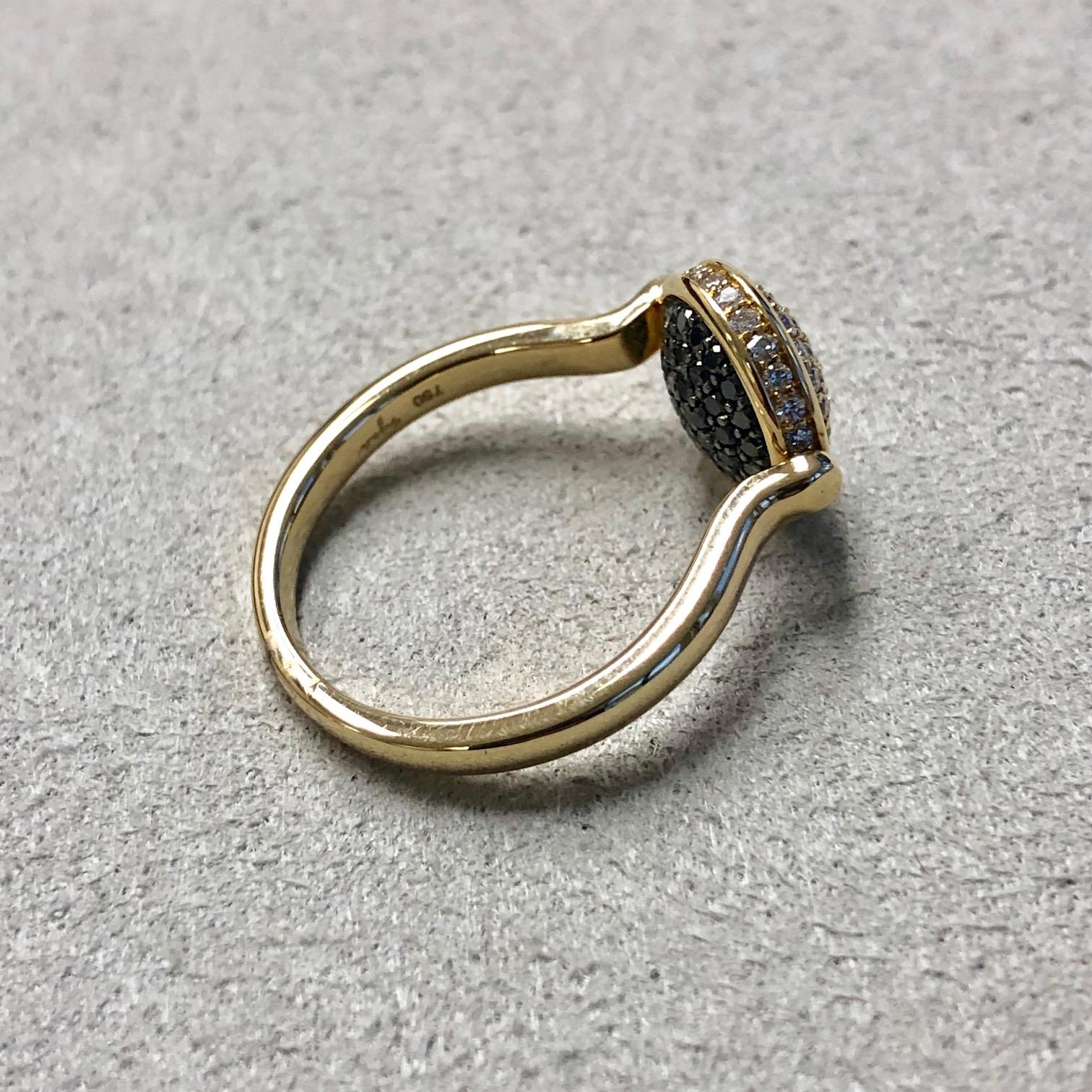 Created in 18 karat yellow gold 
Diamonds 0.35 cts approx
Black diamonds 0.25 cts approx
Reversible ring, can be worn in in both colors on a flip
Ring size US 6.5, can be sized up or down

Finely crafted in 18 karat yellow gold, this reversible ring